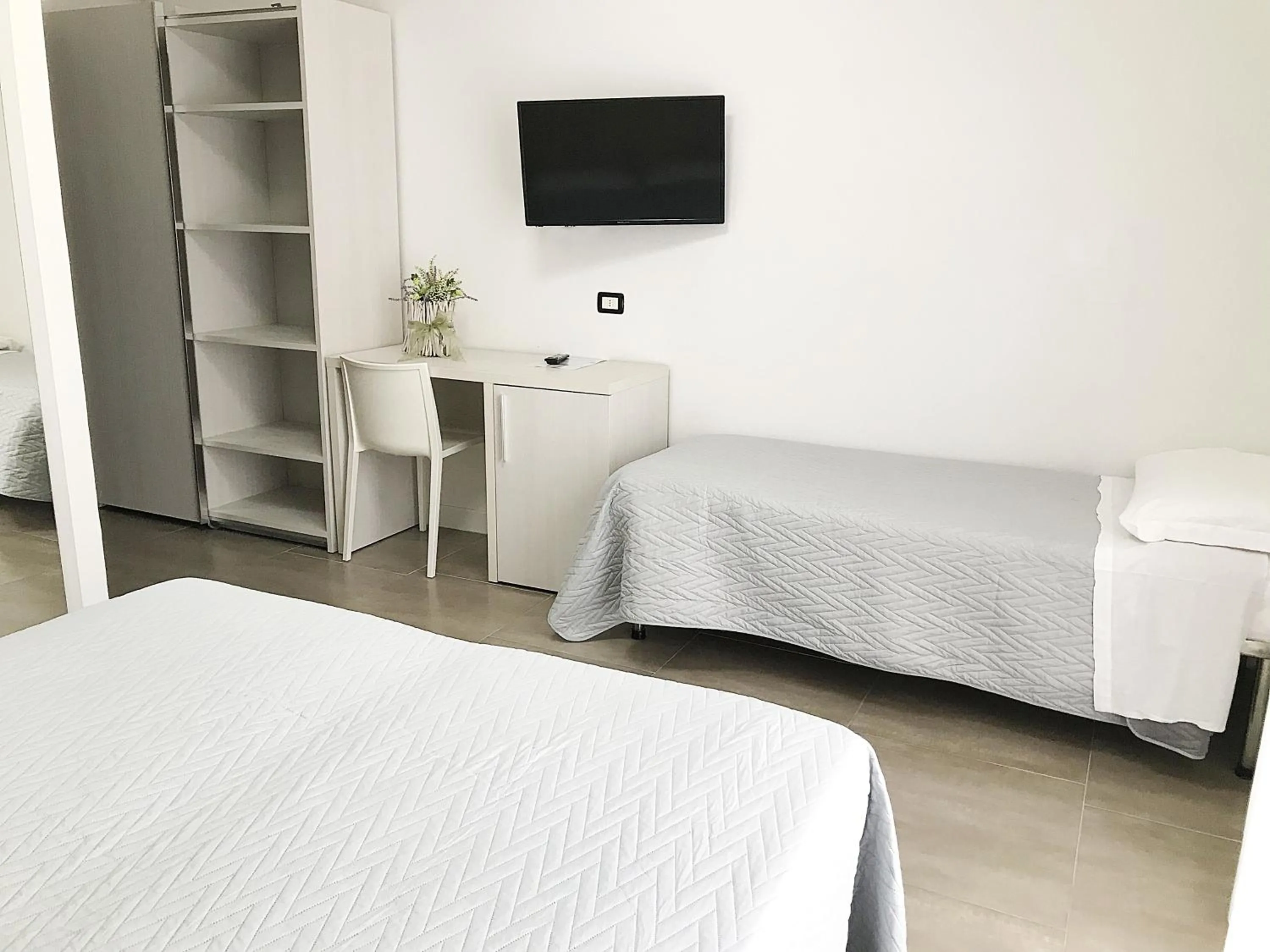 Bed in Hotel Brigantino