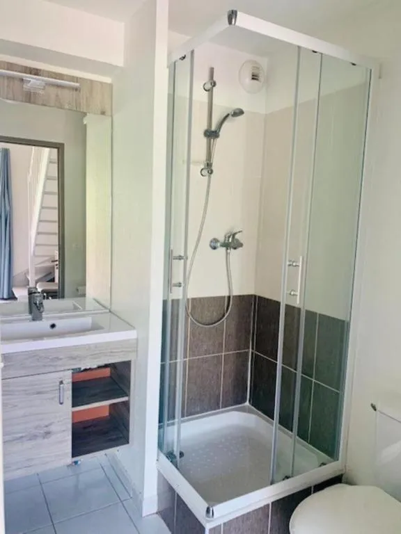 Bathroom in Le Domaine du Golf*** by Ateya Vacances