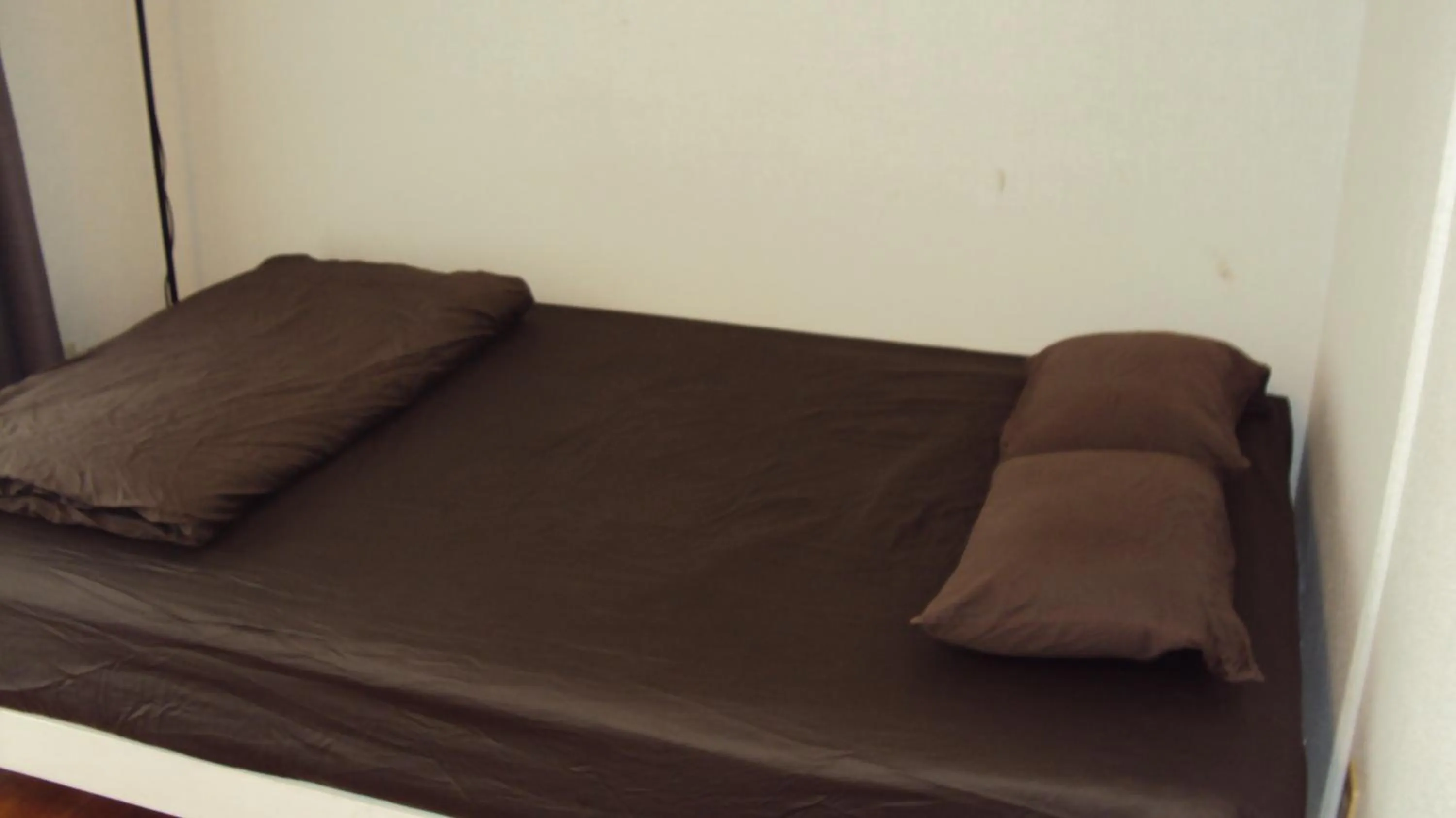 Bed in BIGJOY INN Hirokouji