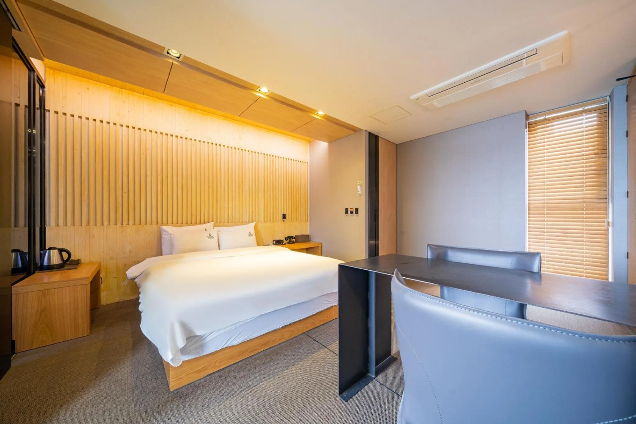 Bed in Louis Boutique Hotel