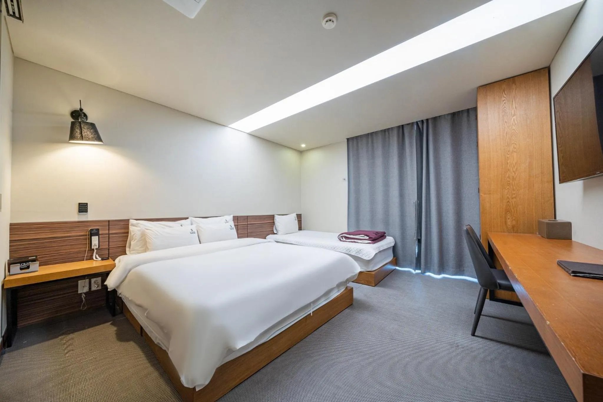 Bed in Louis Boutique Hotel