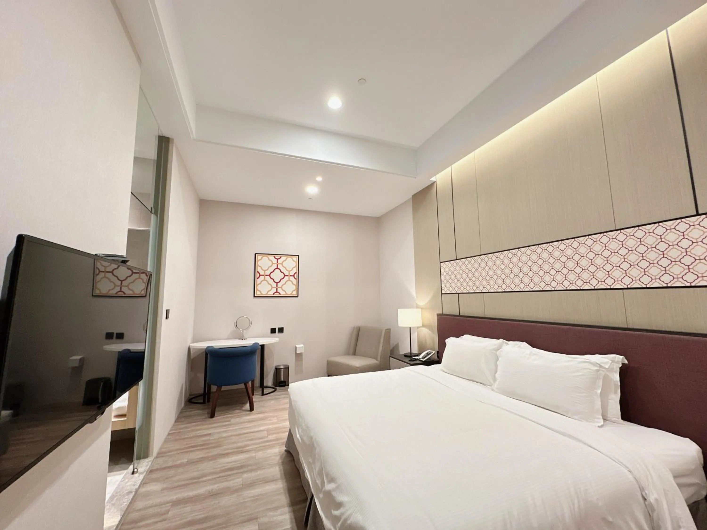 Bed in 台南星鑽國際商旅 Hua Hotel