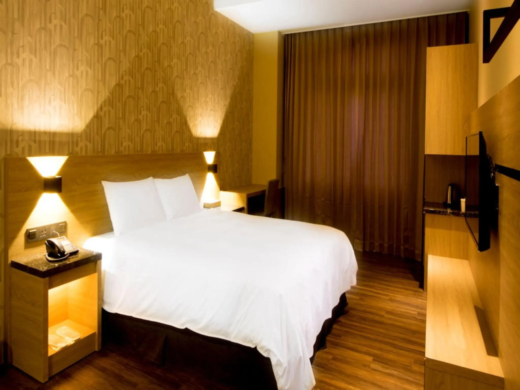 Bed in Yu Chun Hotel