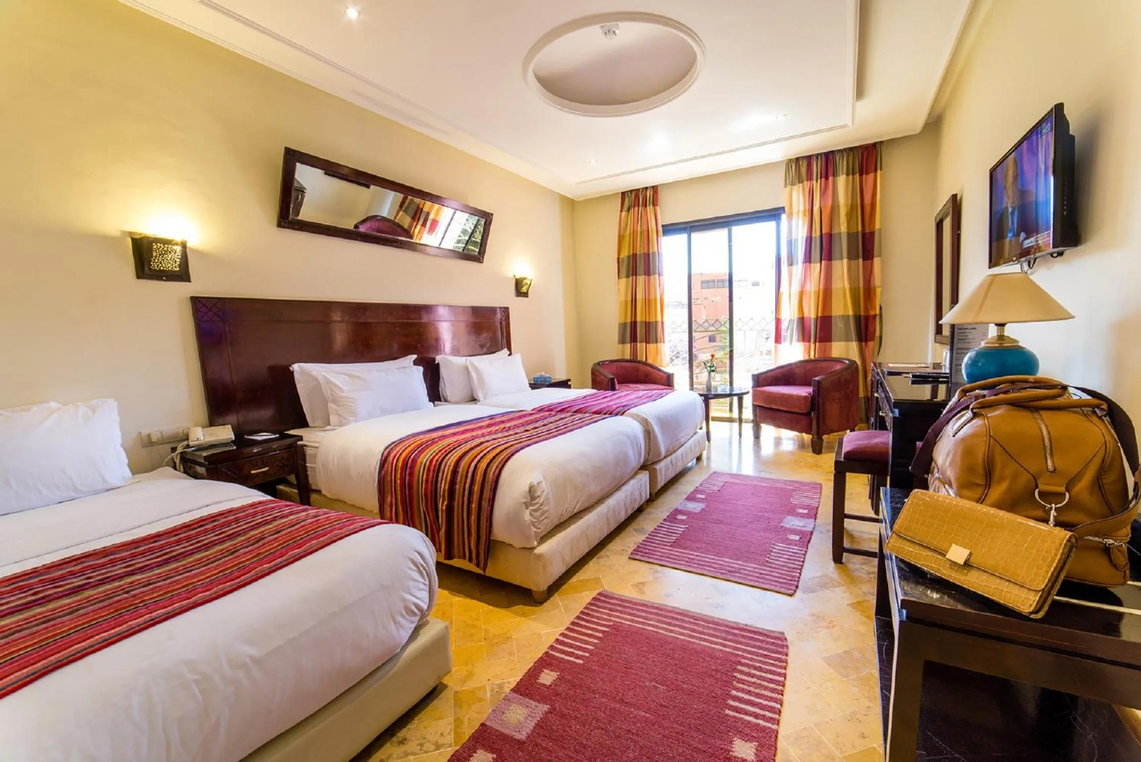 Photo of the whole room in Hotel Les Trois Palmiers