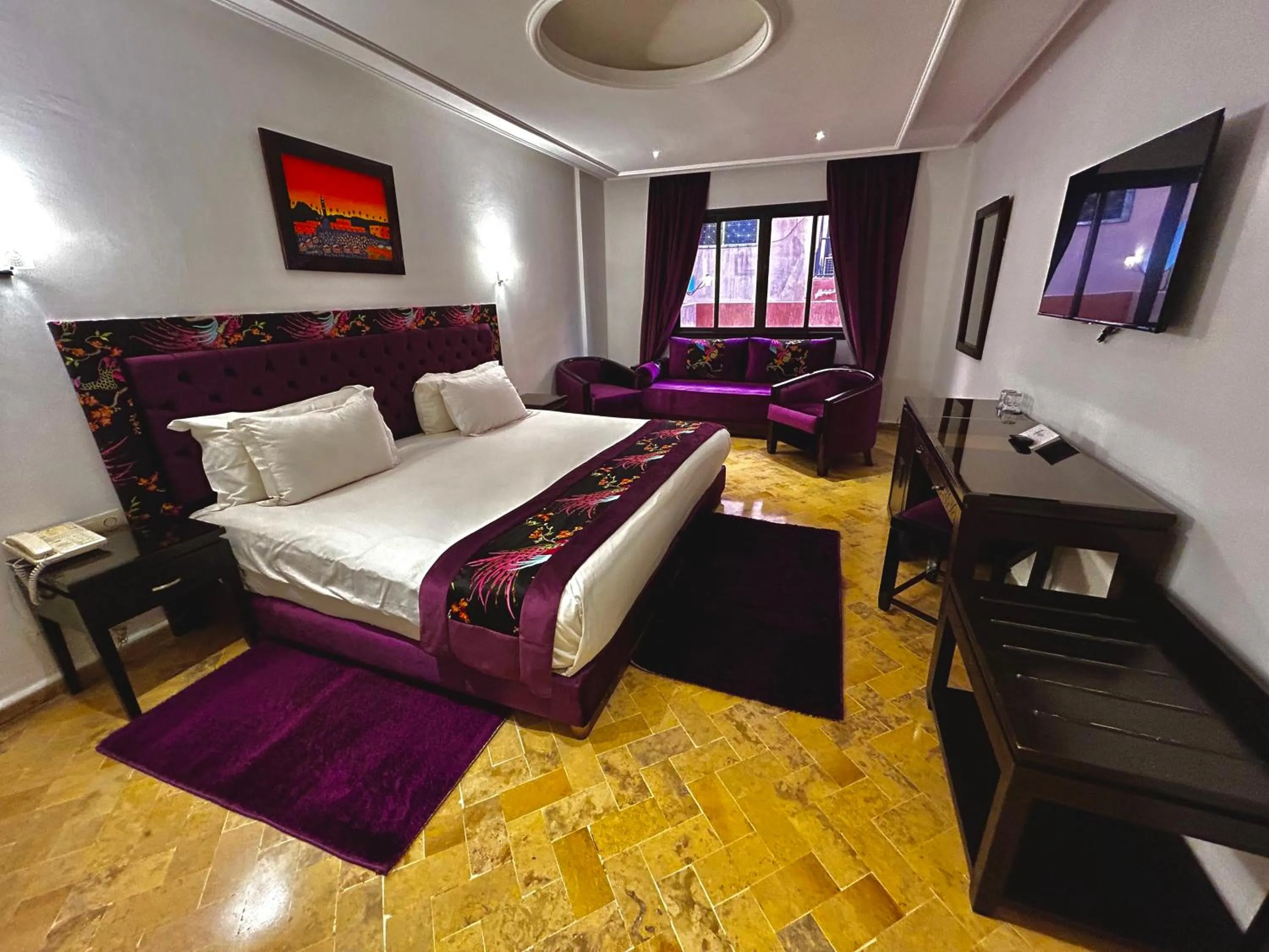 Photo of the whole room in Hotel Les Trois Palmiers