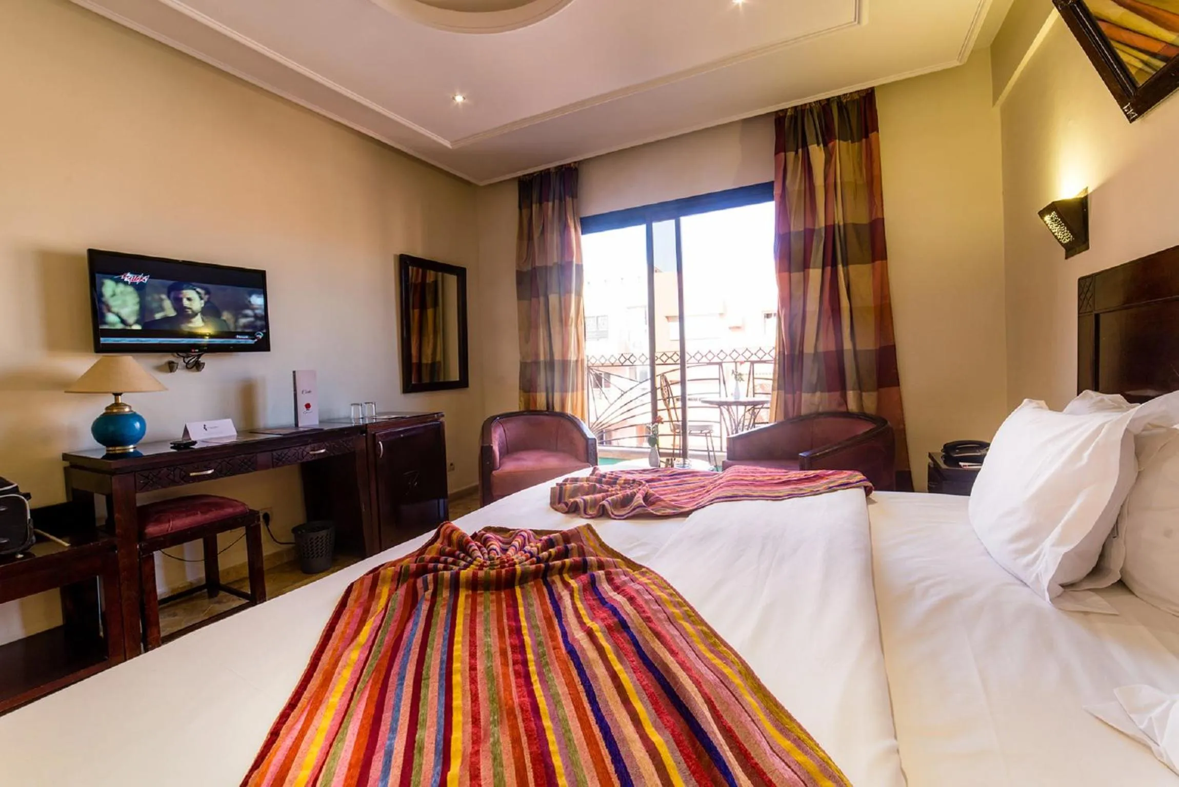 Photo of the whole room in Hotel Les Trois Palmiers