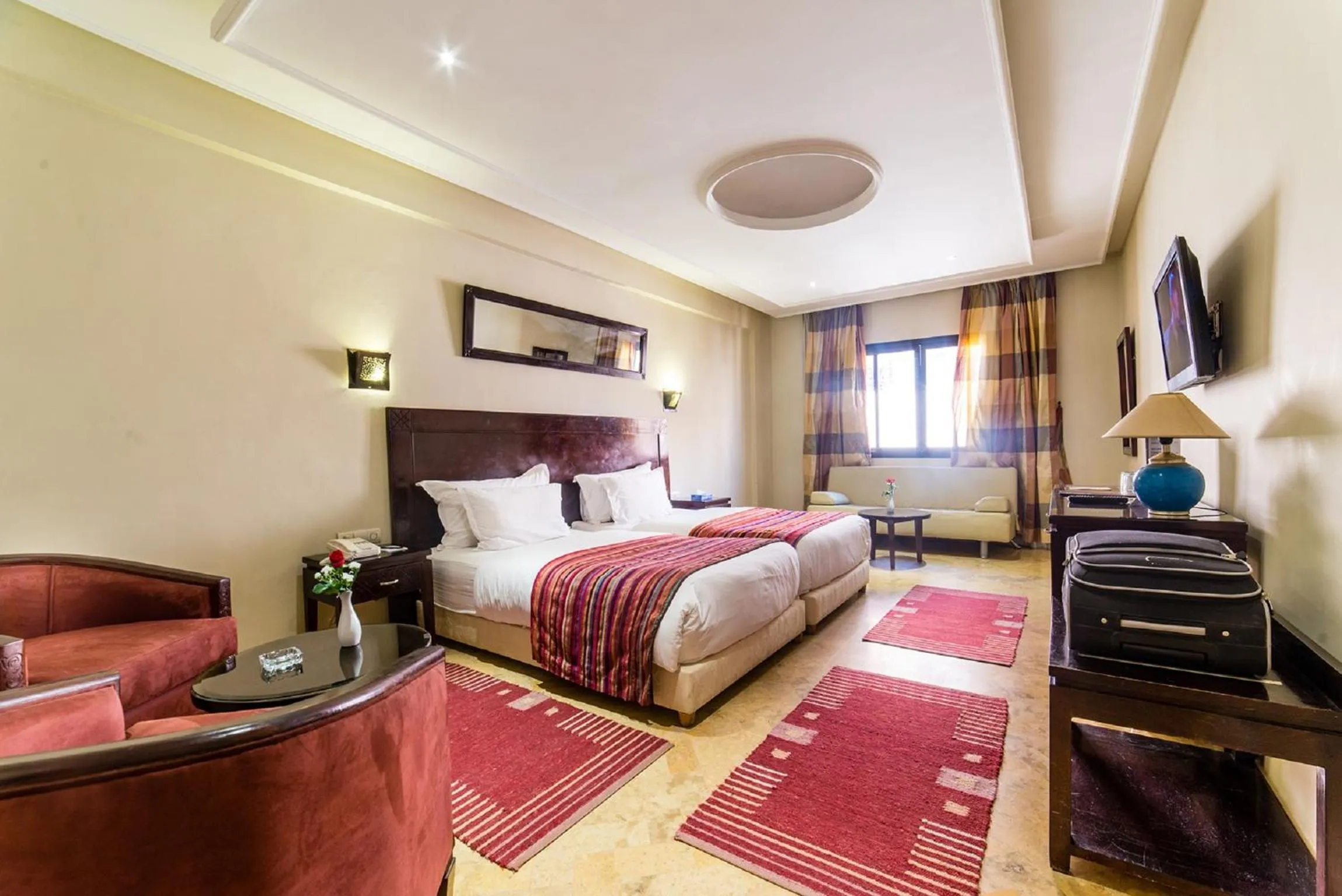 Photo of the whole room in Hotel Les Trois Palmiers