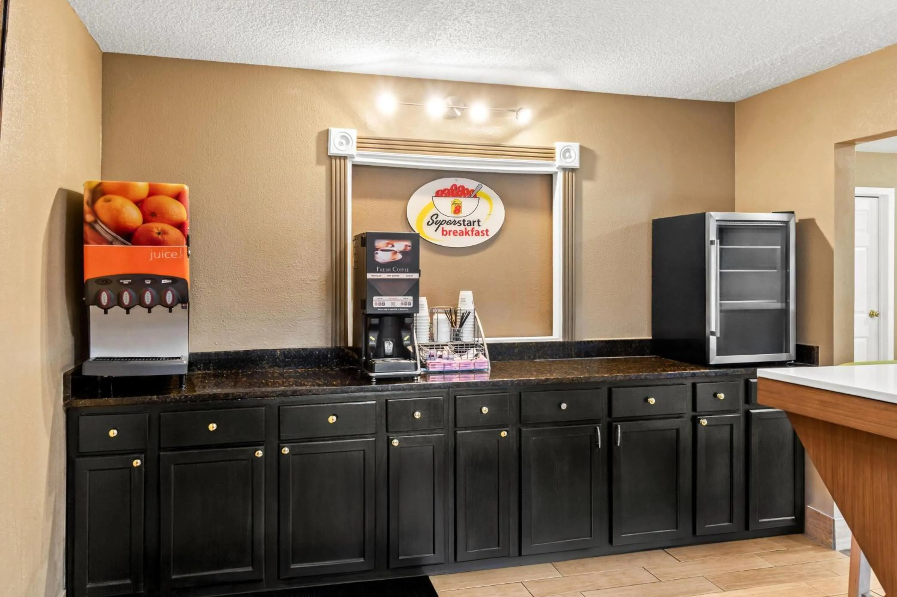 Property building in Super 8 by Wyndham Cincinnati-Springdale OH