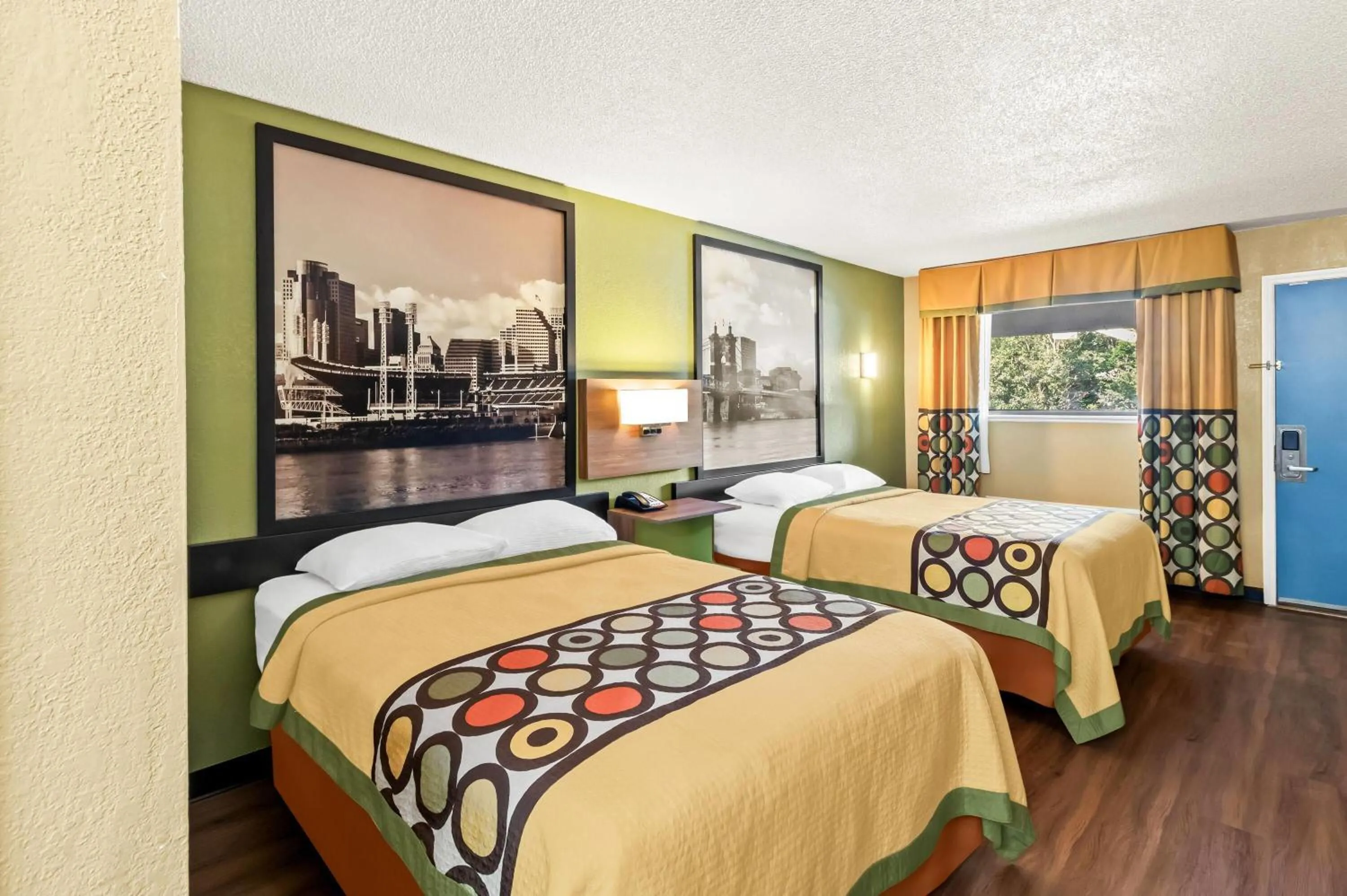 Bed in Super 8 by Wyndham Cincinnati-Springdale OH