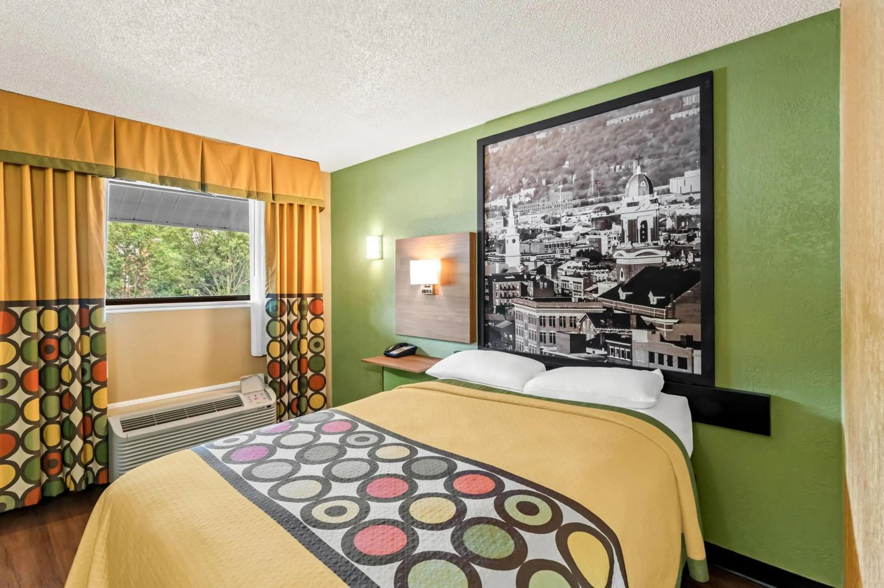 Bed in Super 8 by Wyndham Cincinnati-Springdale OH