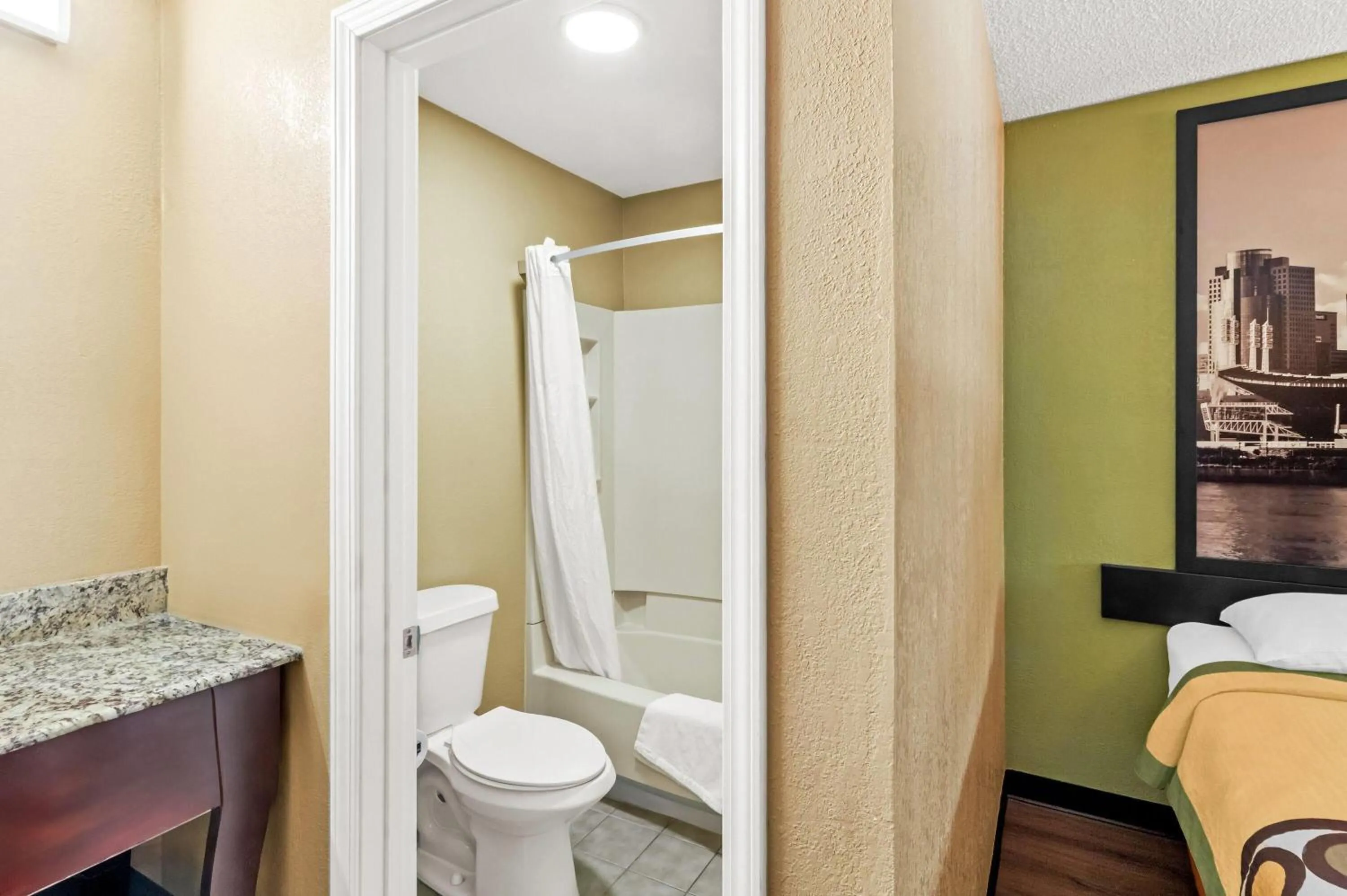 Bathroom in Super 8 by Wyndham Cincinnati-Springdale OH