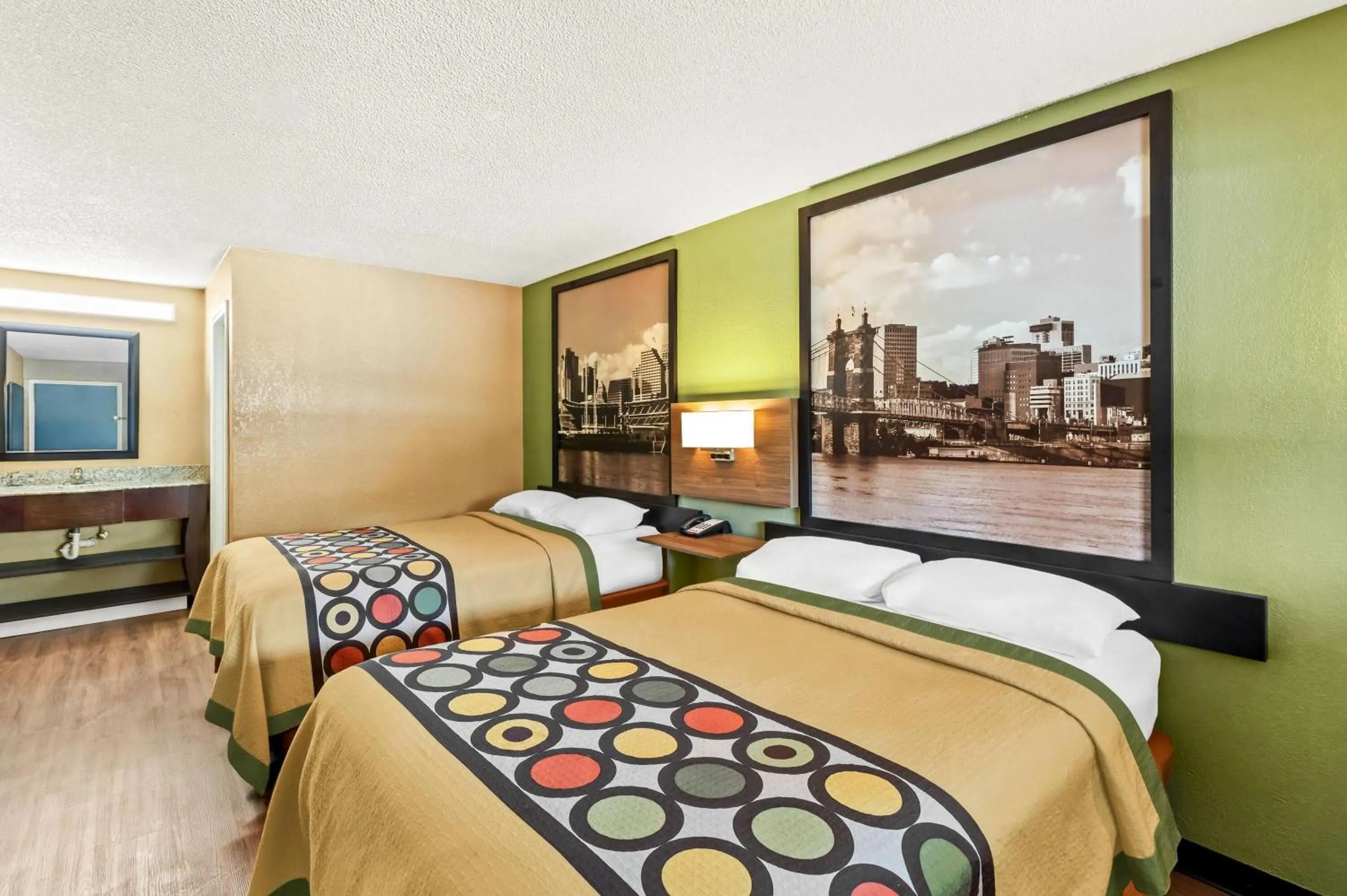 Bed in Super 8 by Wyndham Cincinnati-Springdale OH