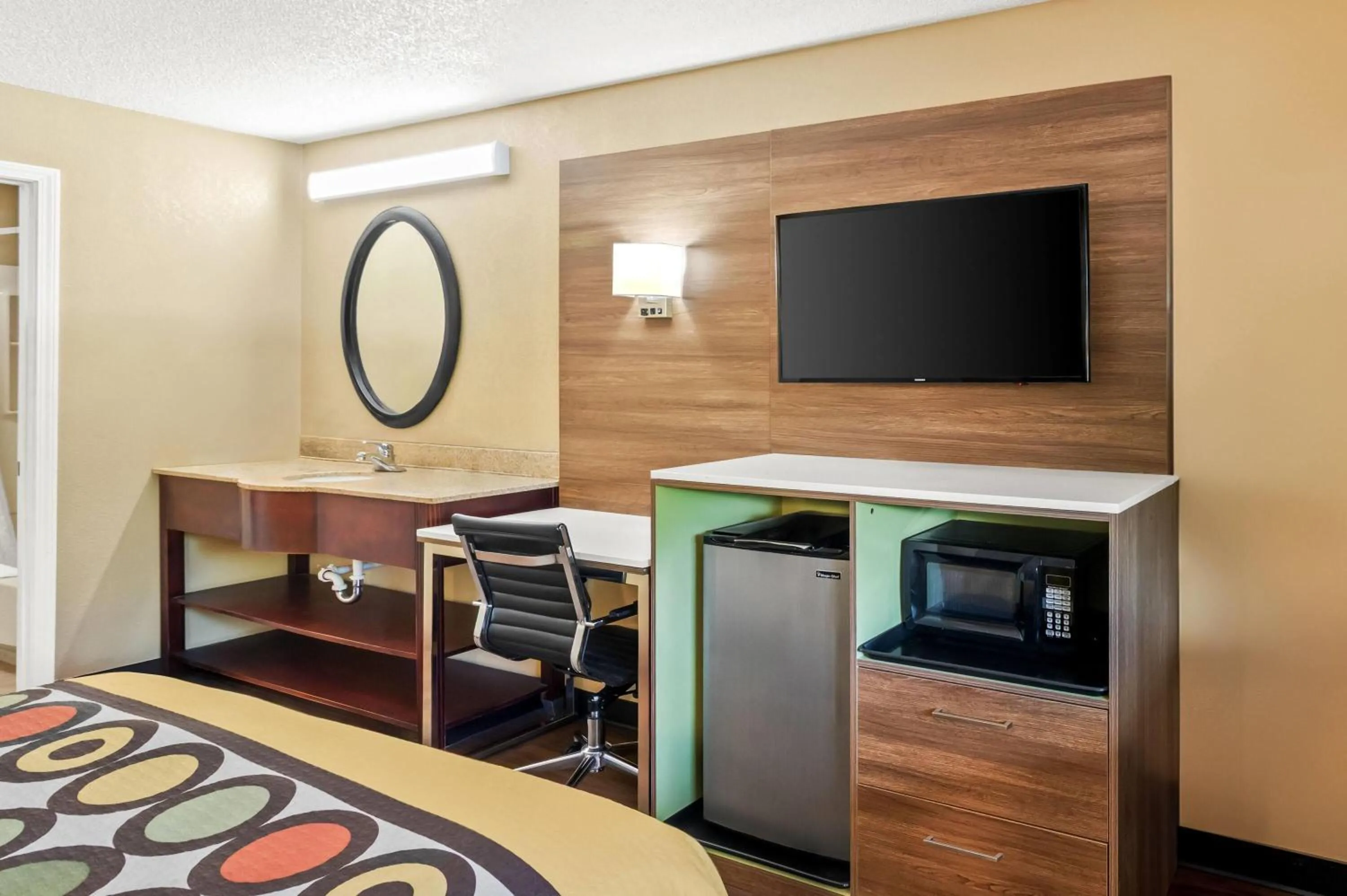 Bed in Super 8 by Wyndham Cincinnati-Springdale OH