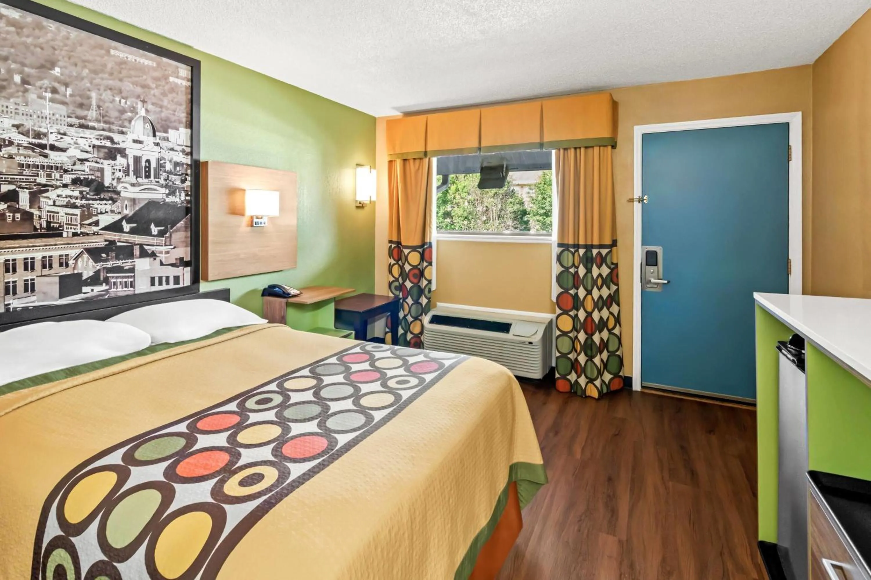 Bed in Super 8 by Wyndham Cincinnati-Springdale OH