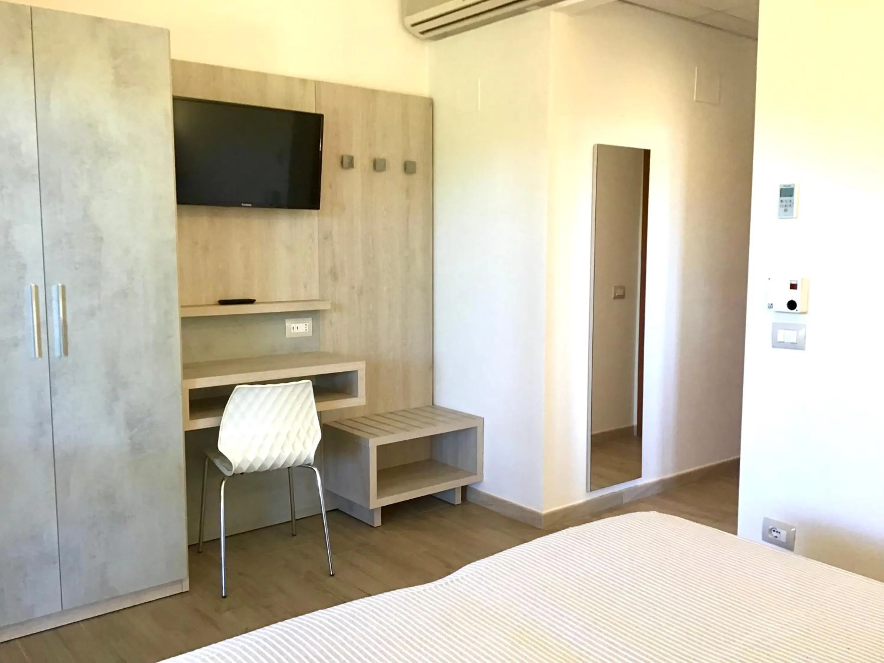 Photo of the whole room in La Coccinella Residence