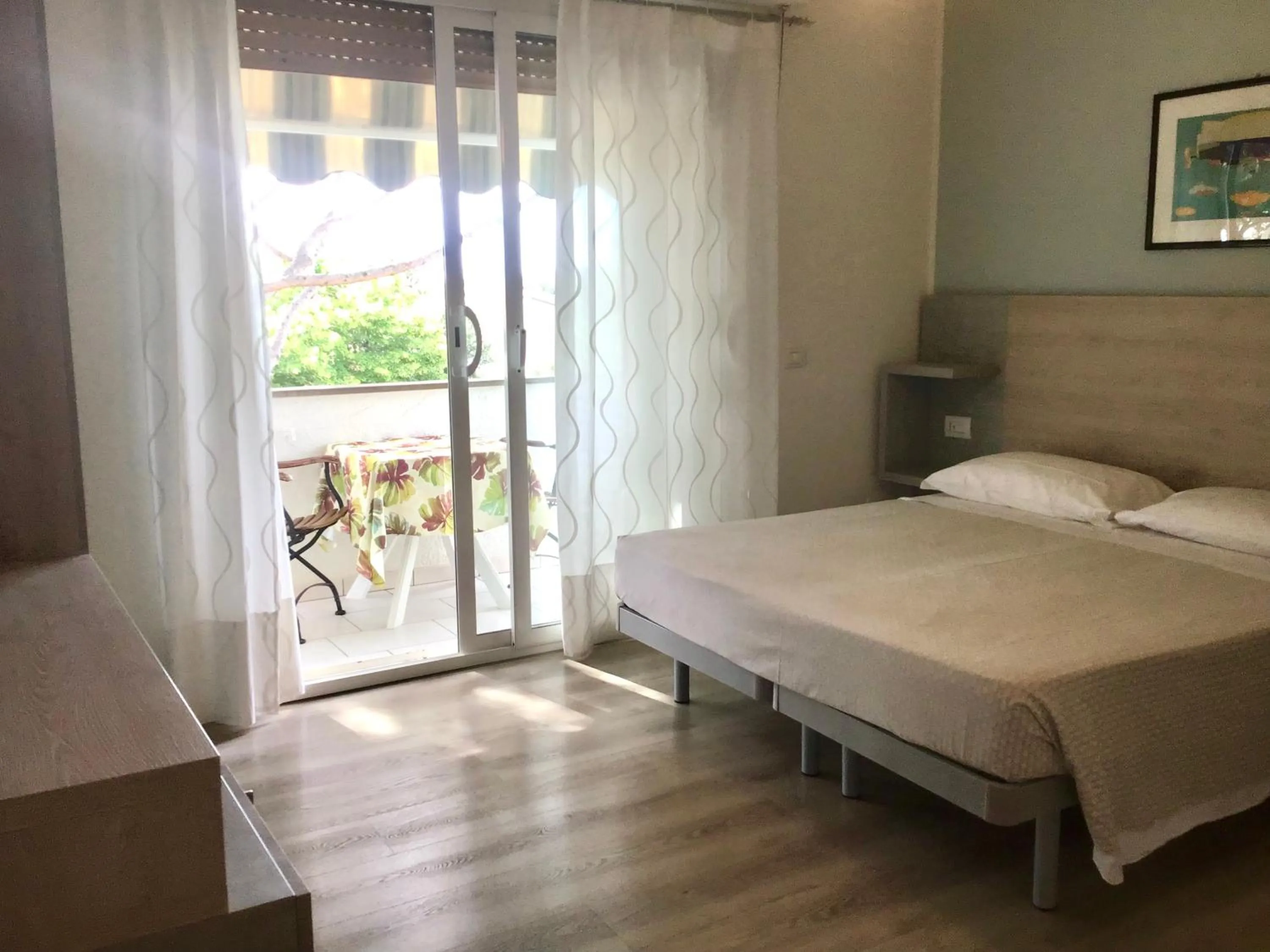 Photo of the whole room in La Coccinella Residence