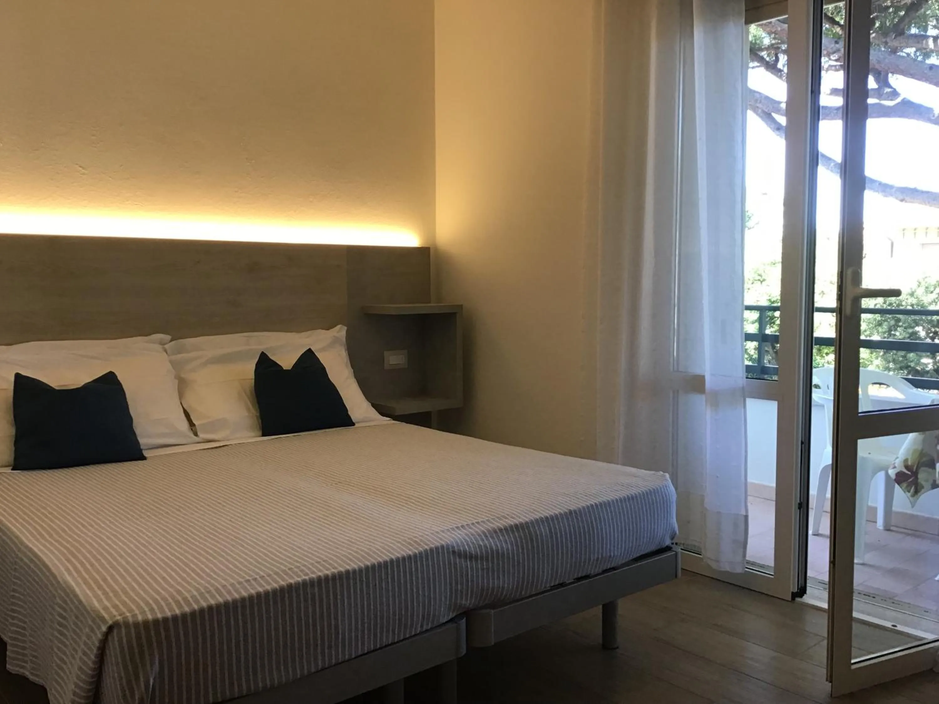 Photo of the whole room in La Coccinella Residence