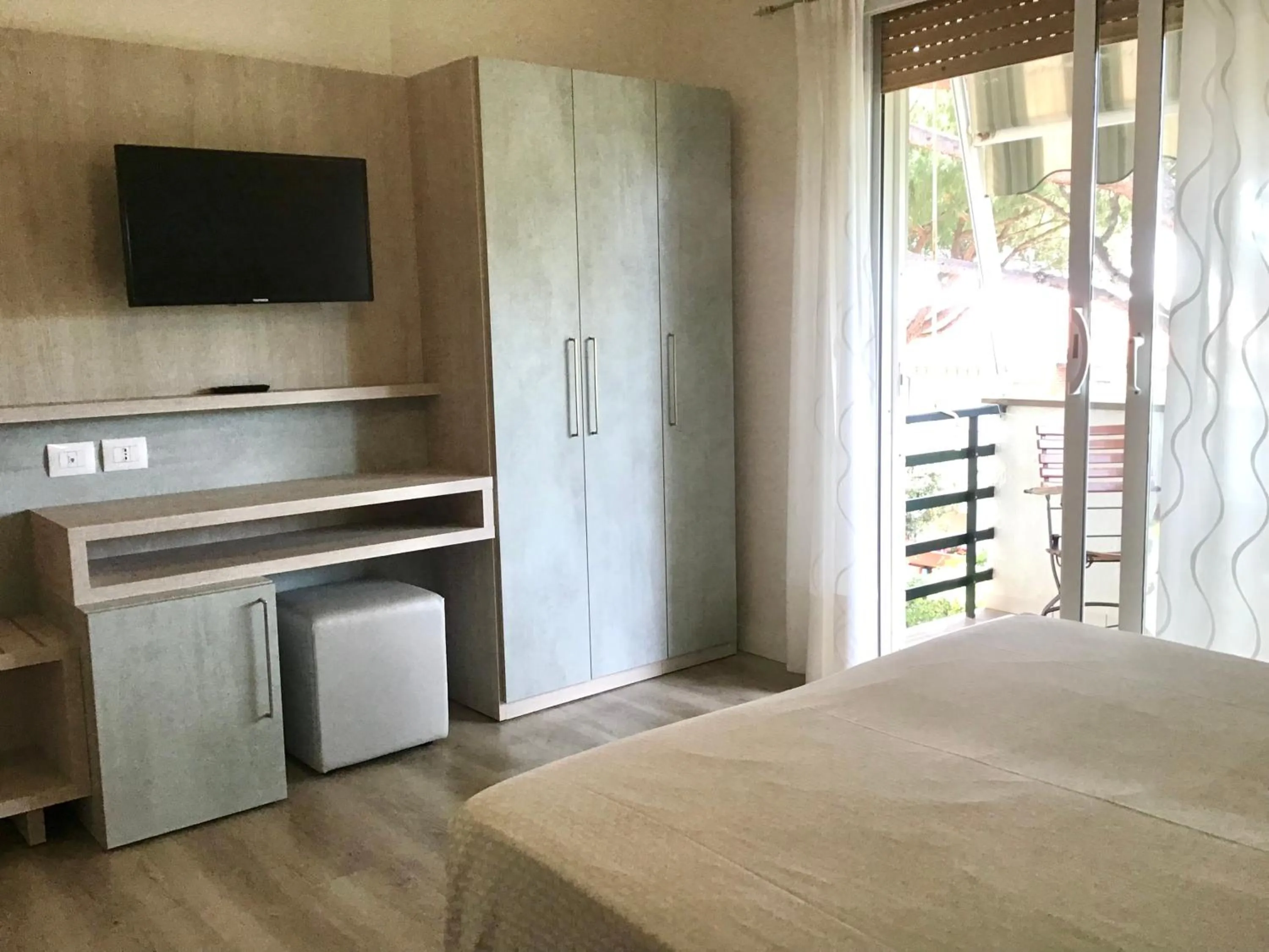 Photo of the whole room in La Coccinella Residence