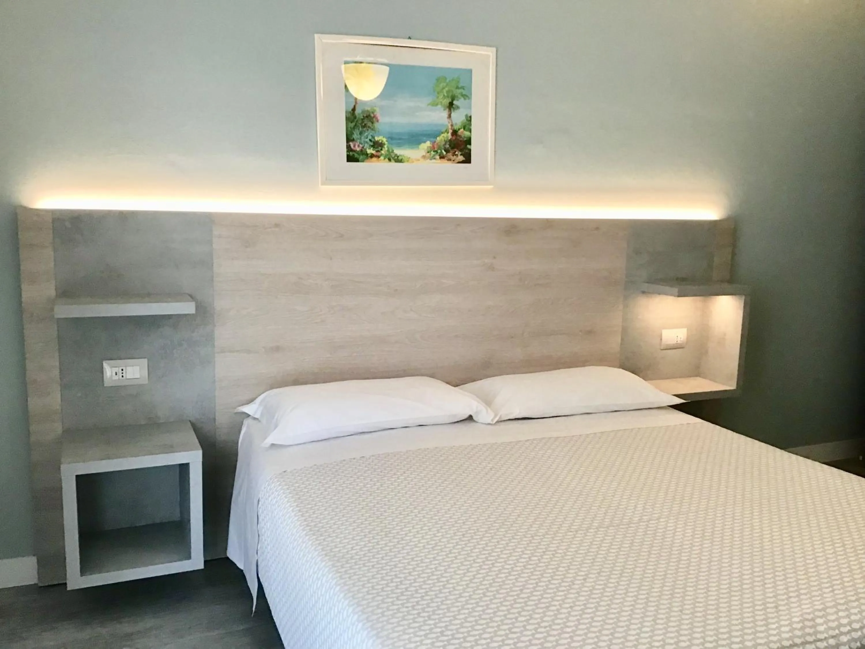 Bedroom in La Coccinella Residence