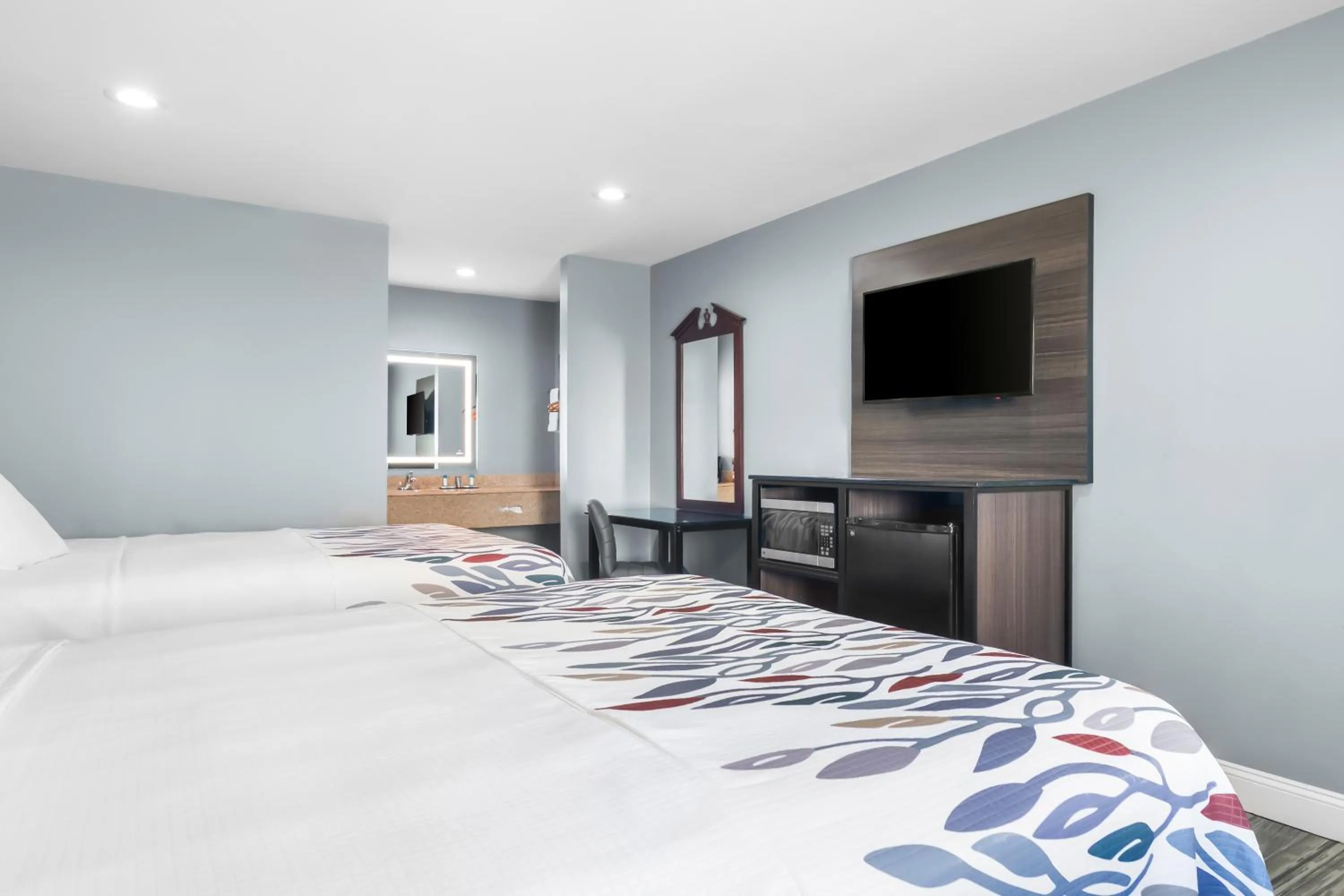 Bed in Americas Best Value Inn and Suites Siloam Springs