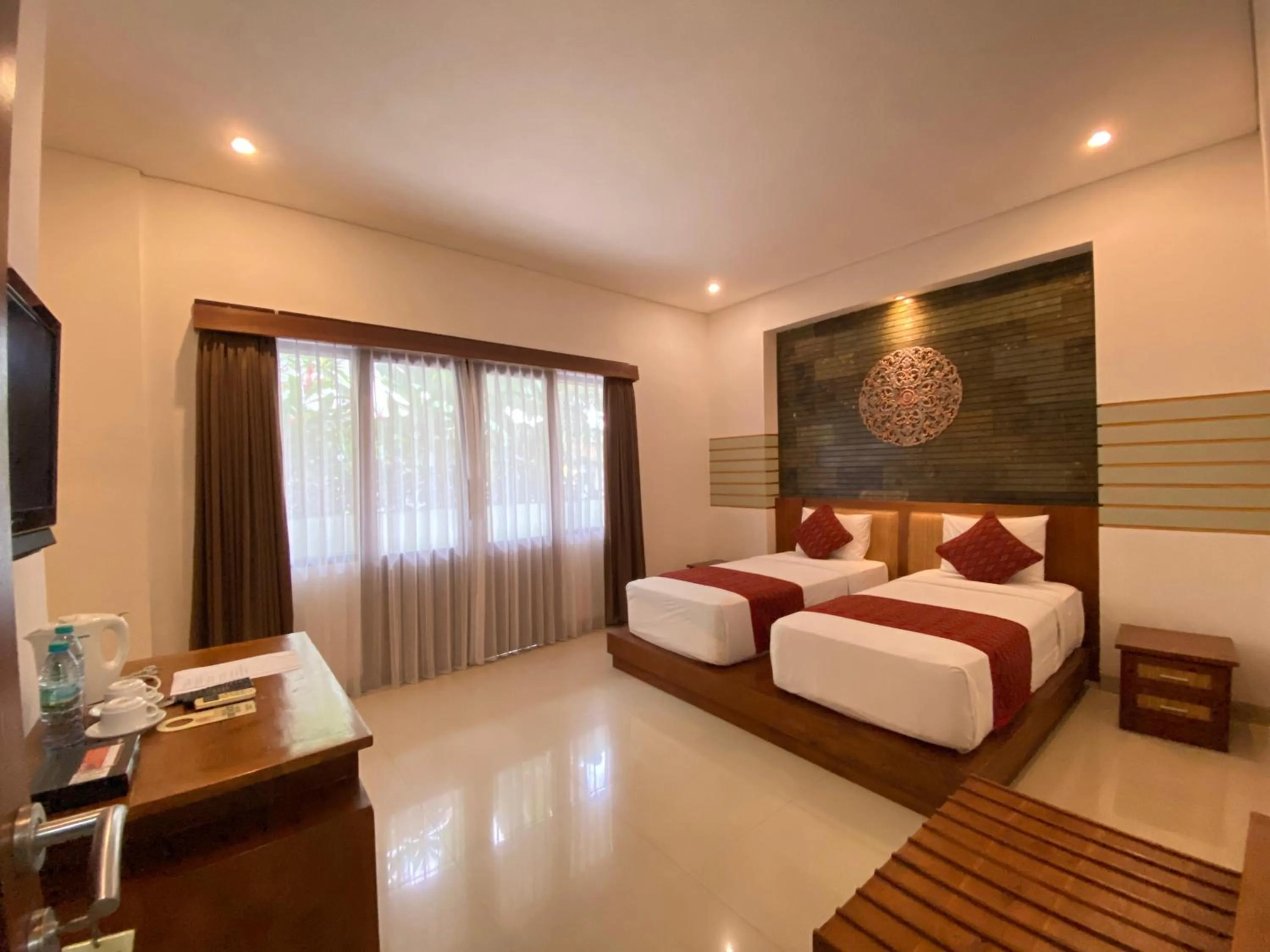 TV and multimedia, Bed in Putri Ayu Cottages