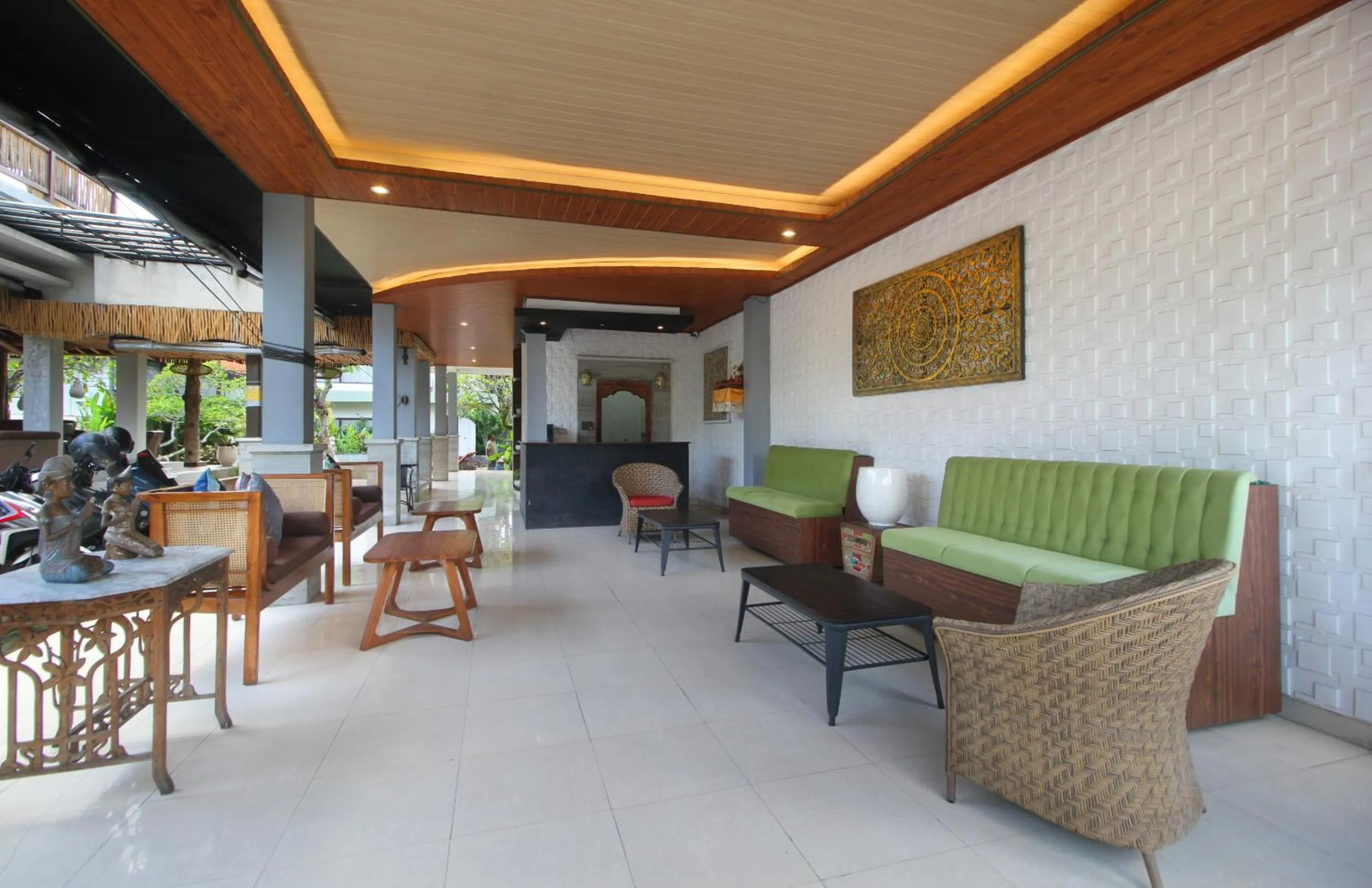 Lobby or reception in Putri Ayu Cottages