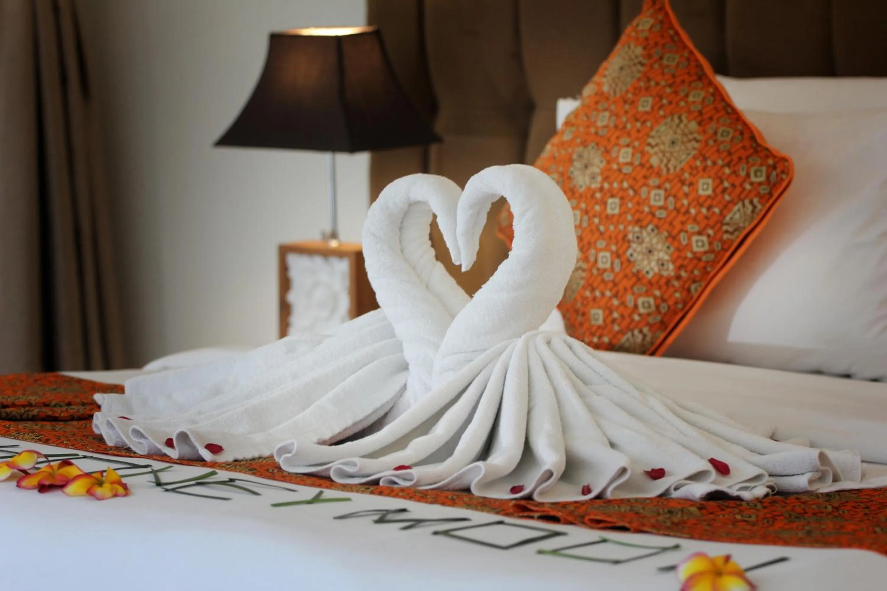 Bed in Putri Ayu Cottages