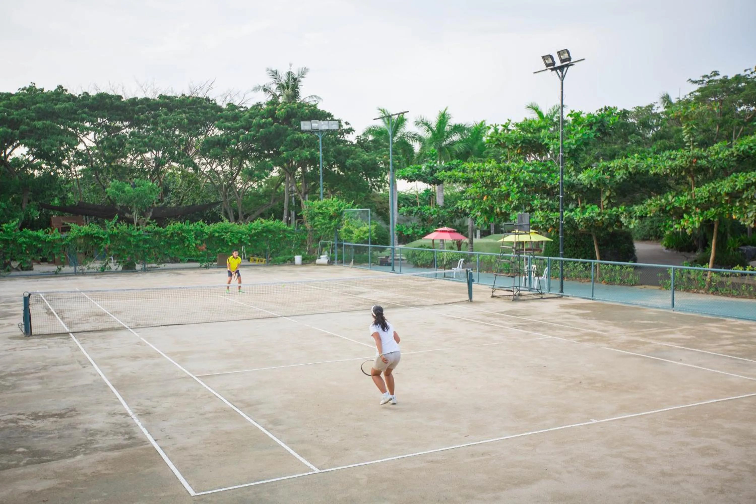 Tennis court in Plantation Bay a Real Resort with a Real Spa