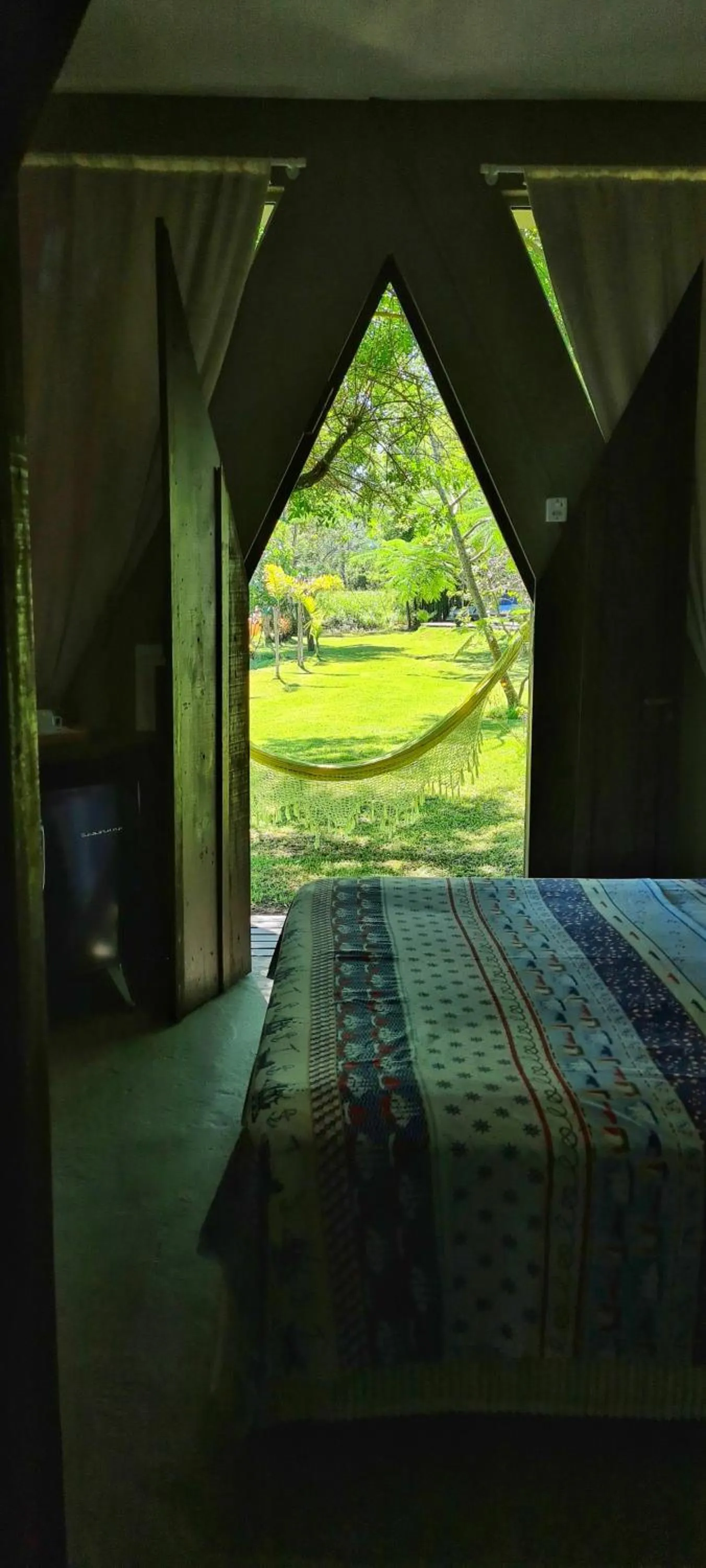 Garden view, Bed in Pousada Areias do Embaú