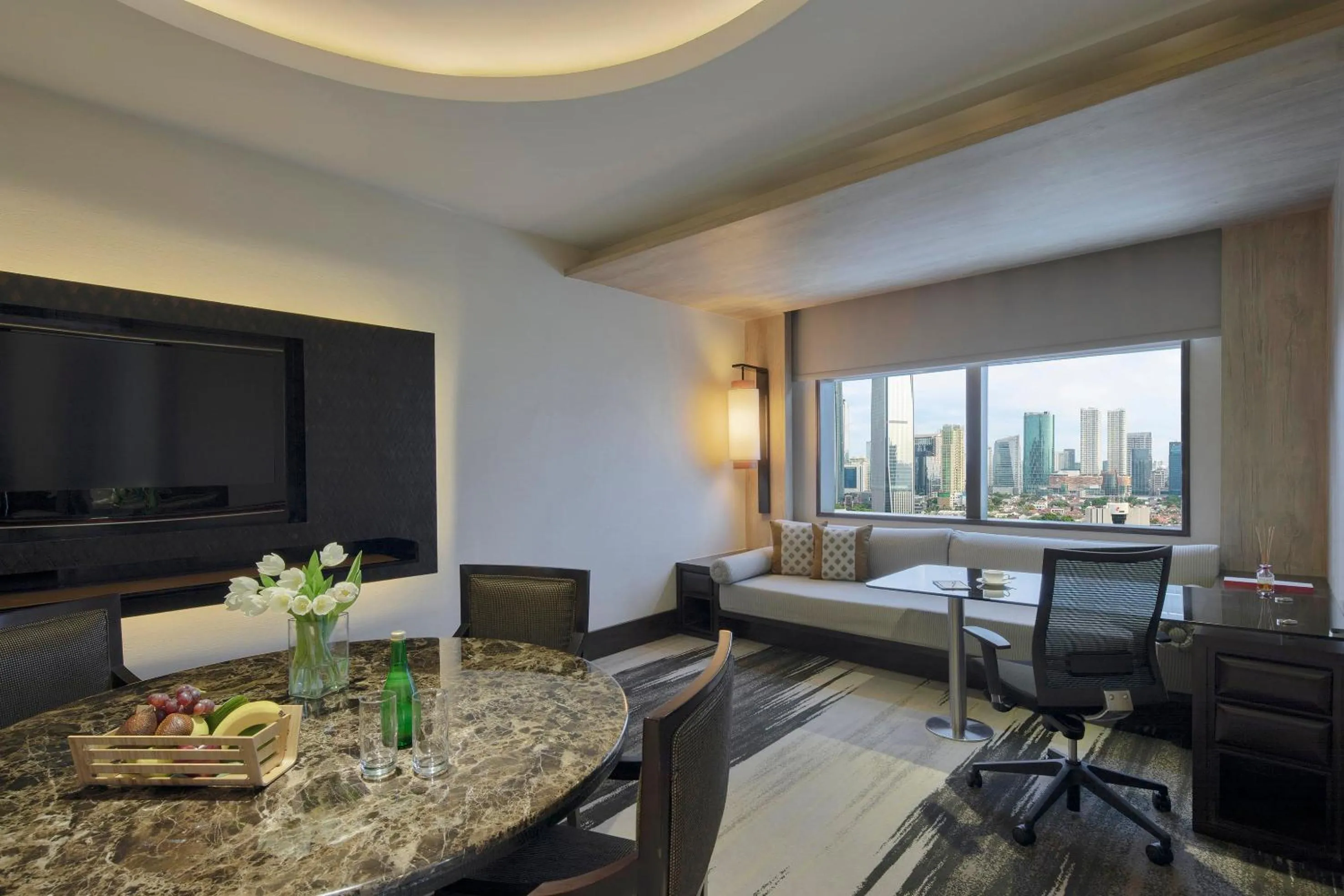 Living room, Bed in Gran Melia Jakarta