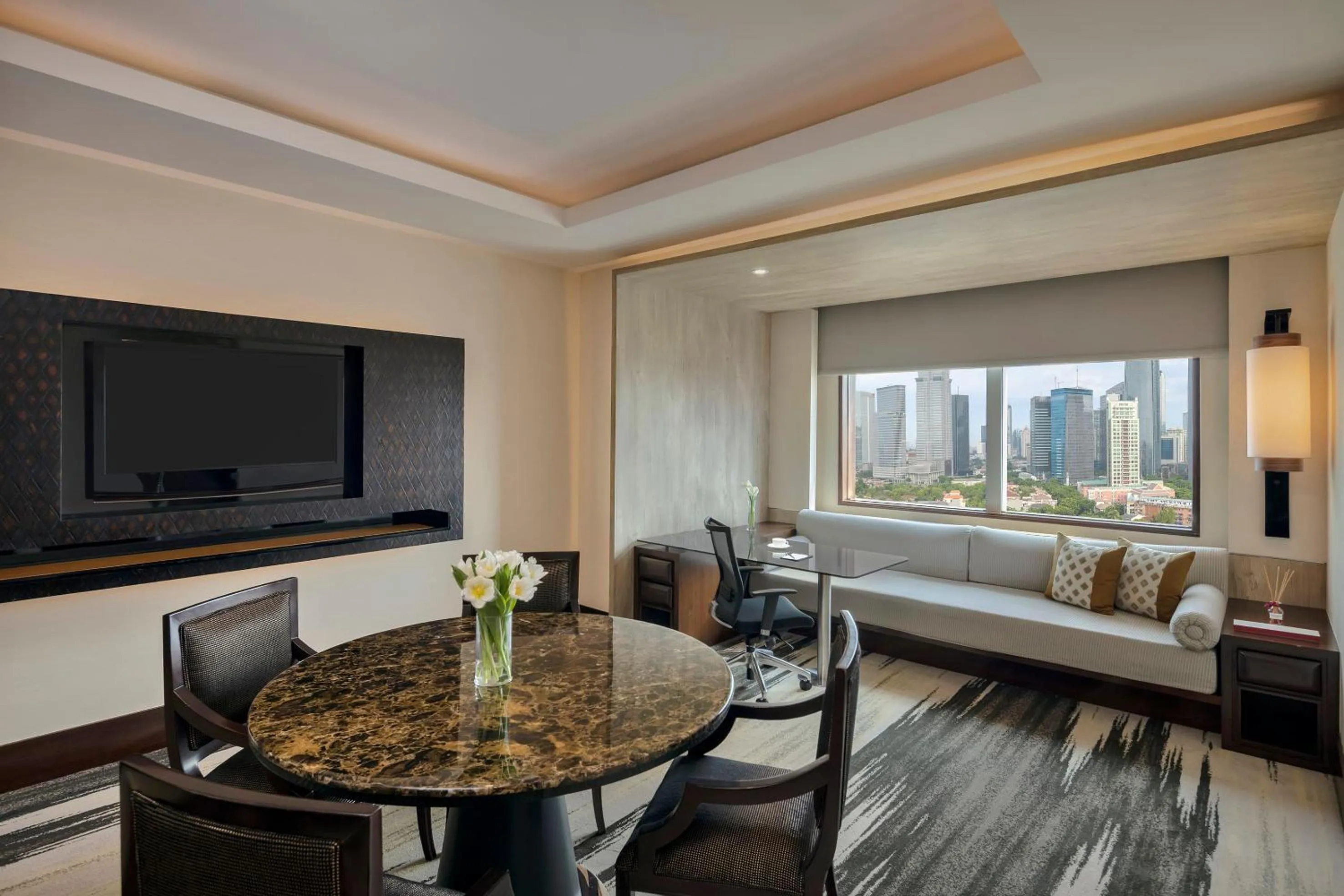 Living room, Bed in Gran Melia Jakarta