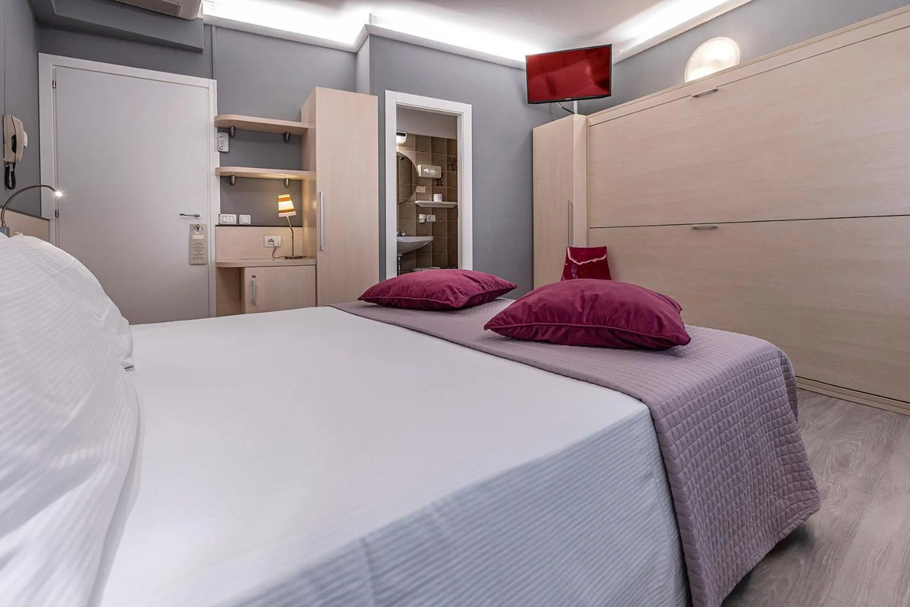 Bed in Albergo Aurora