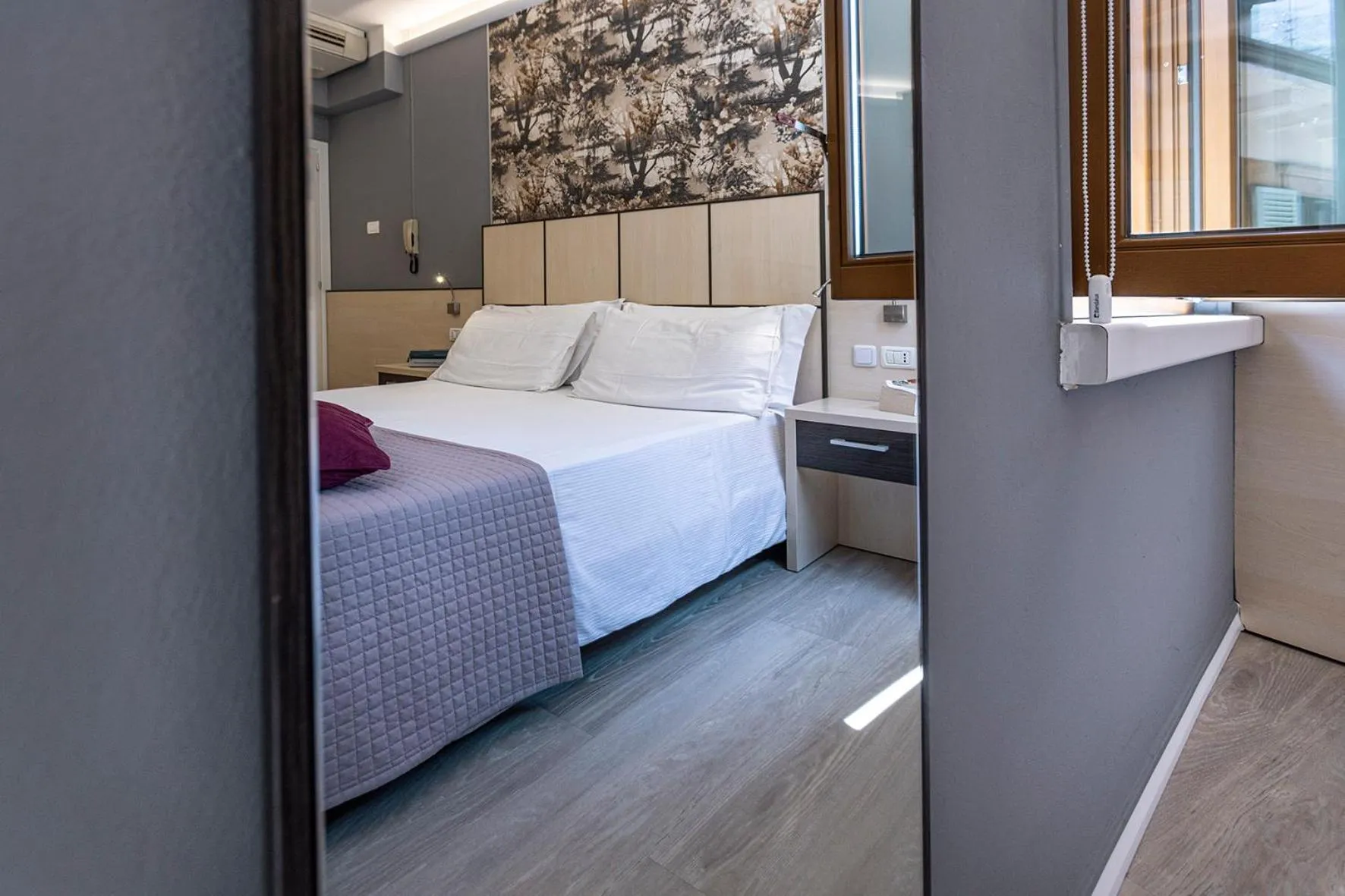 Bed in Albergo Aurora