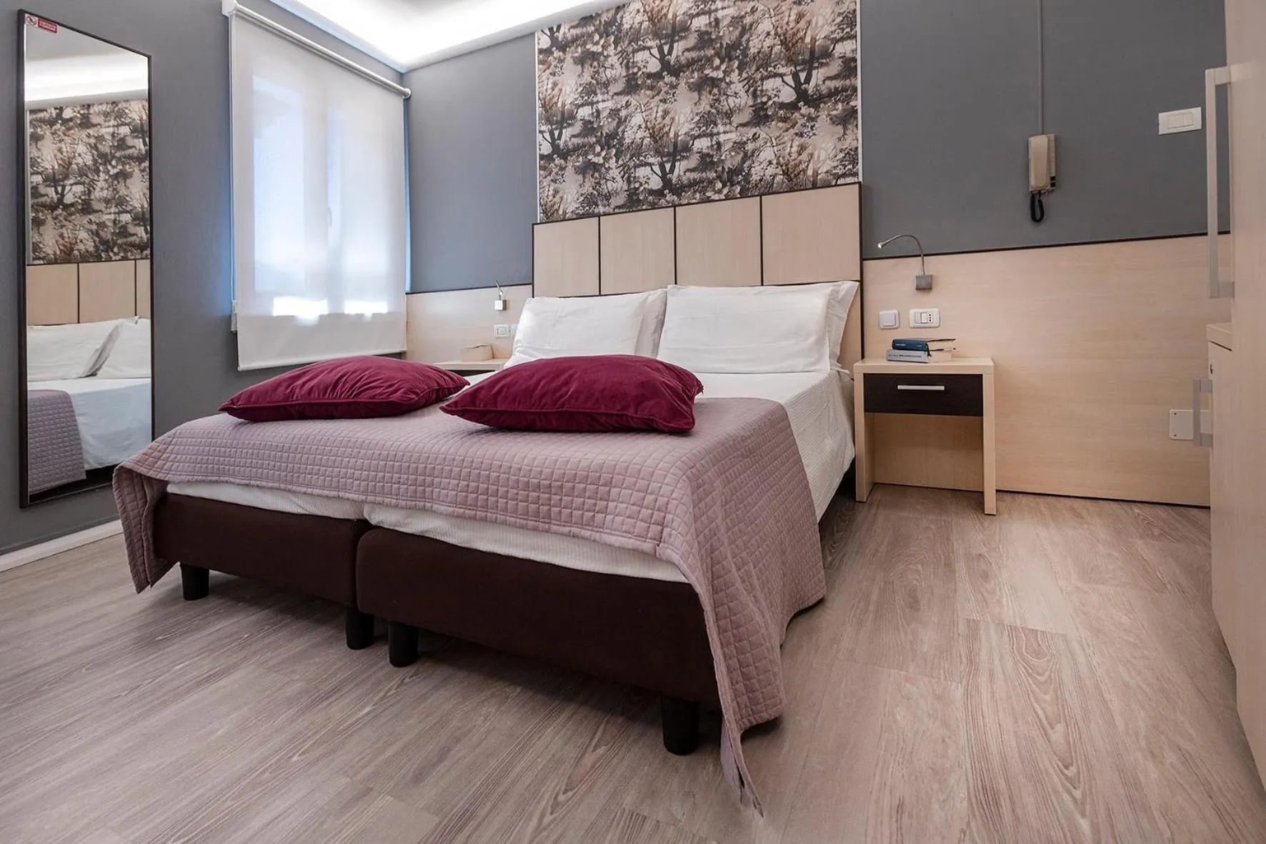 Bed in Albergo Aurora
