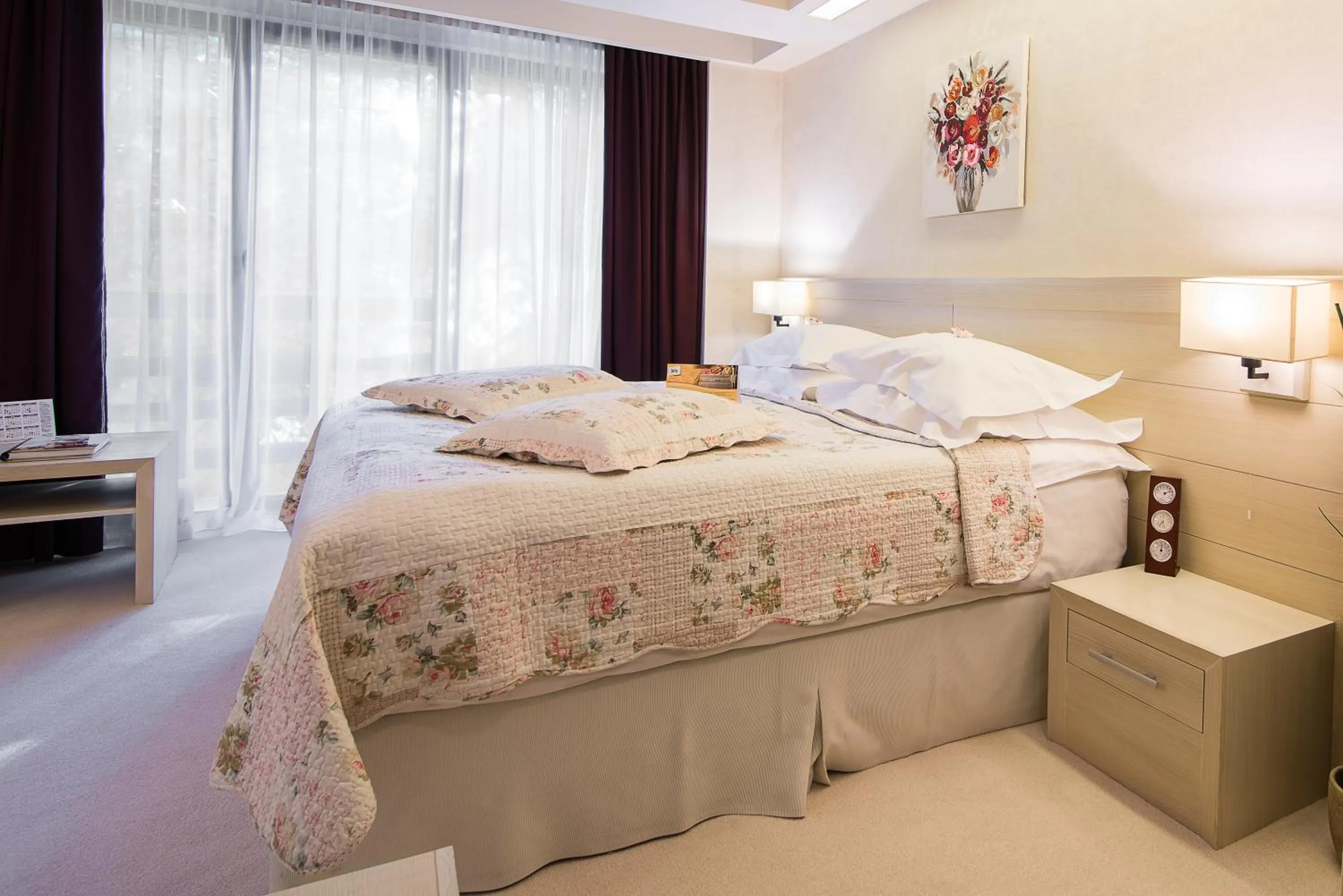 Bed in Ioana Boutique Hotel