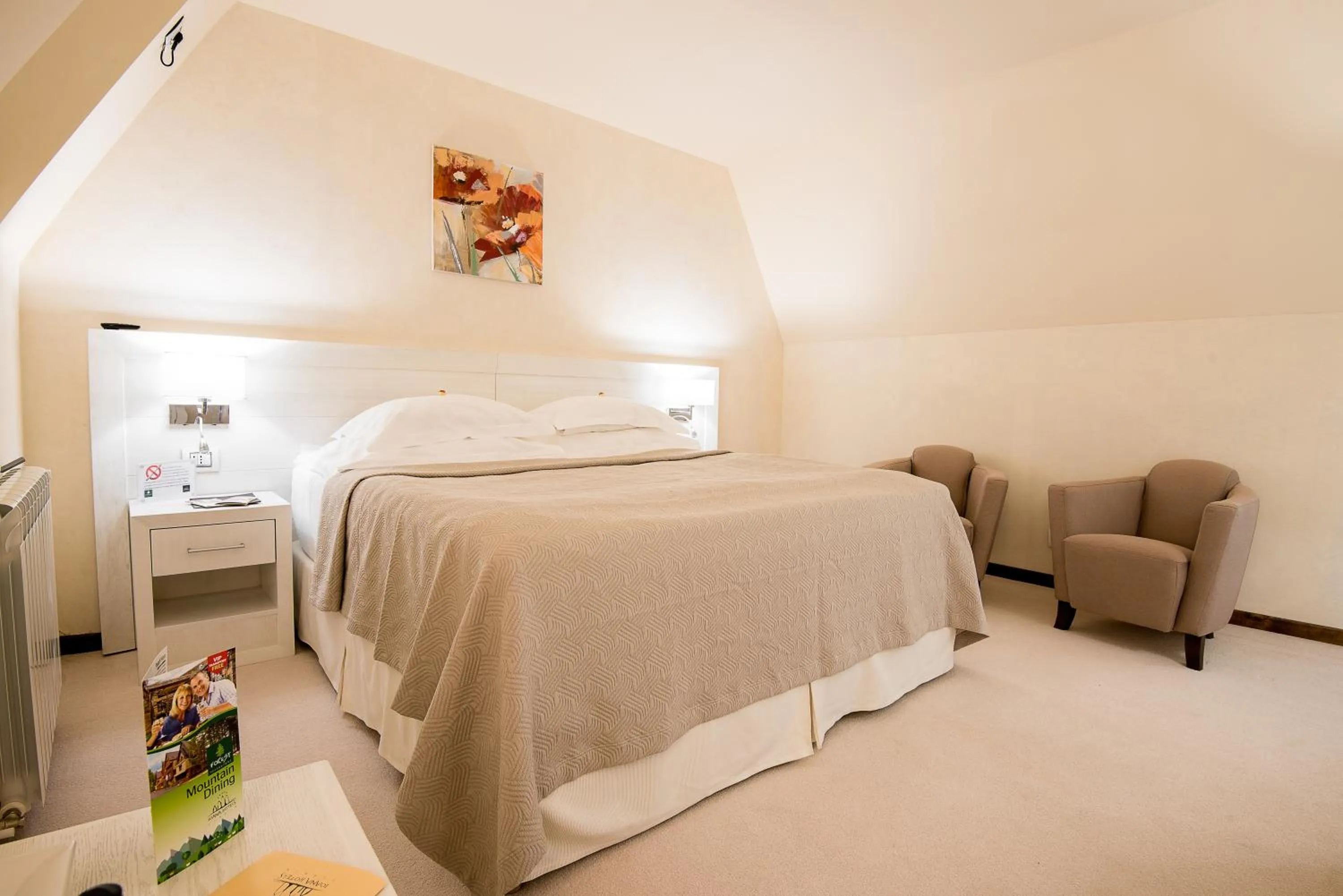 Bed in Ioana Boutique Hotel