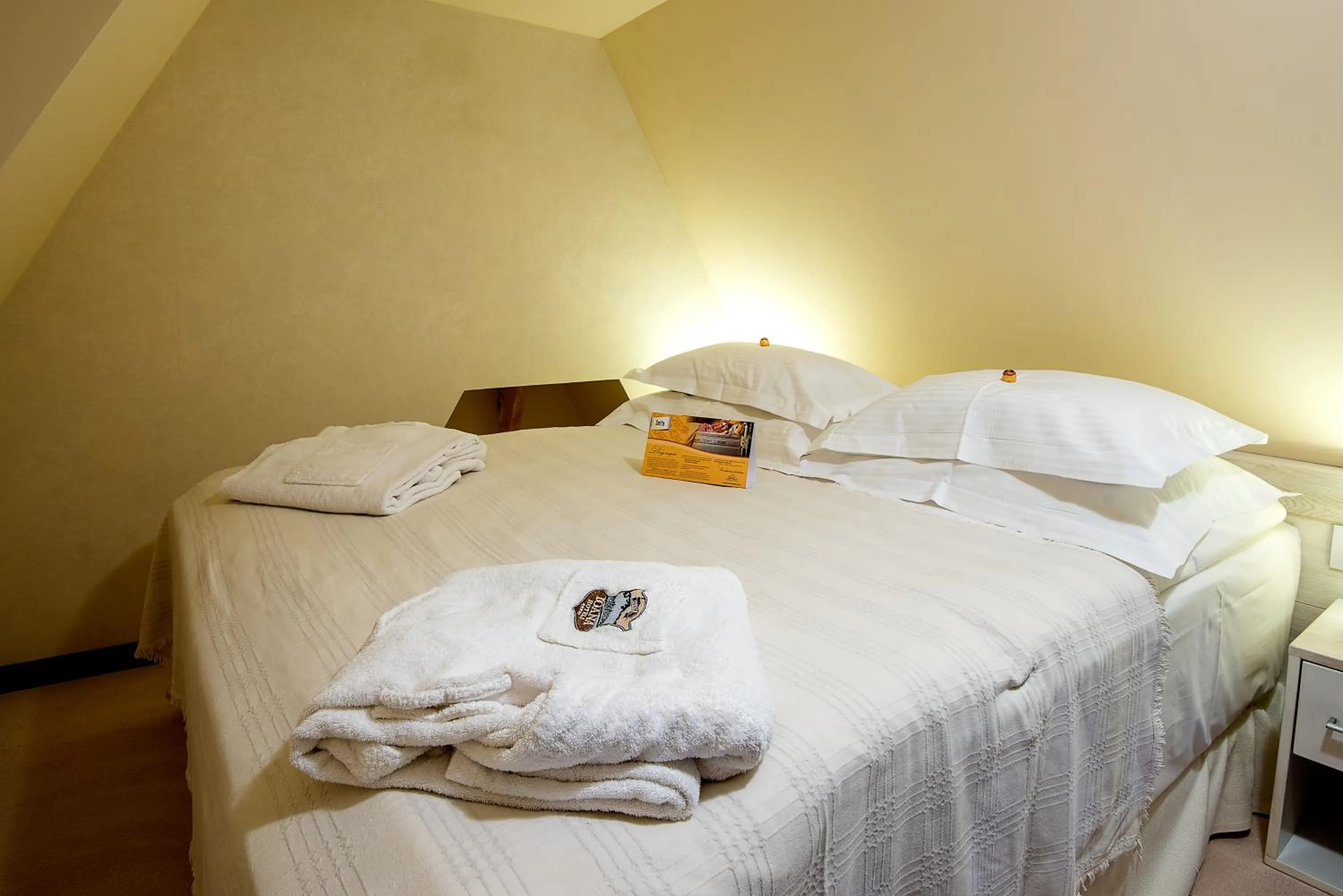 Bed in Ioana Boutique Hotel