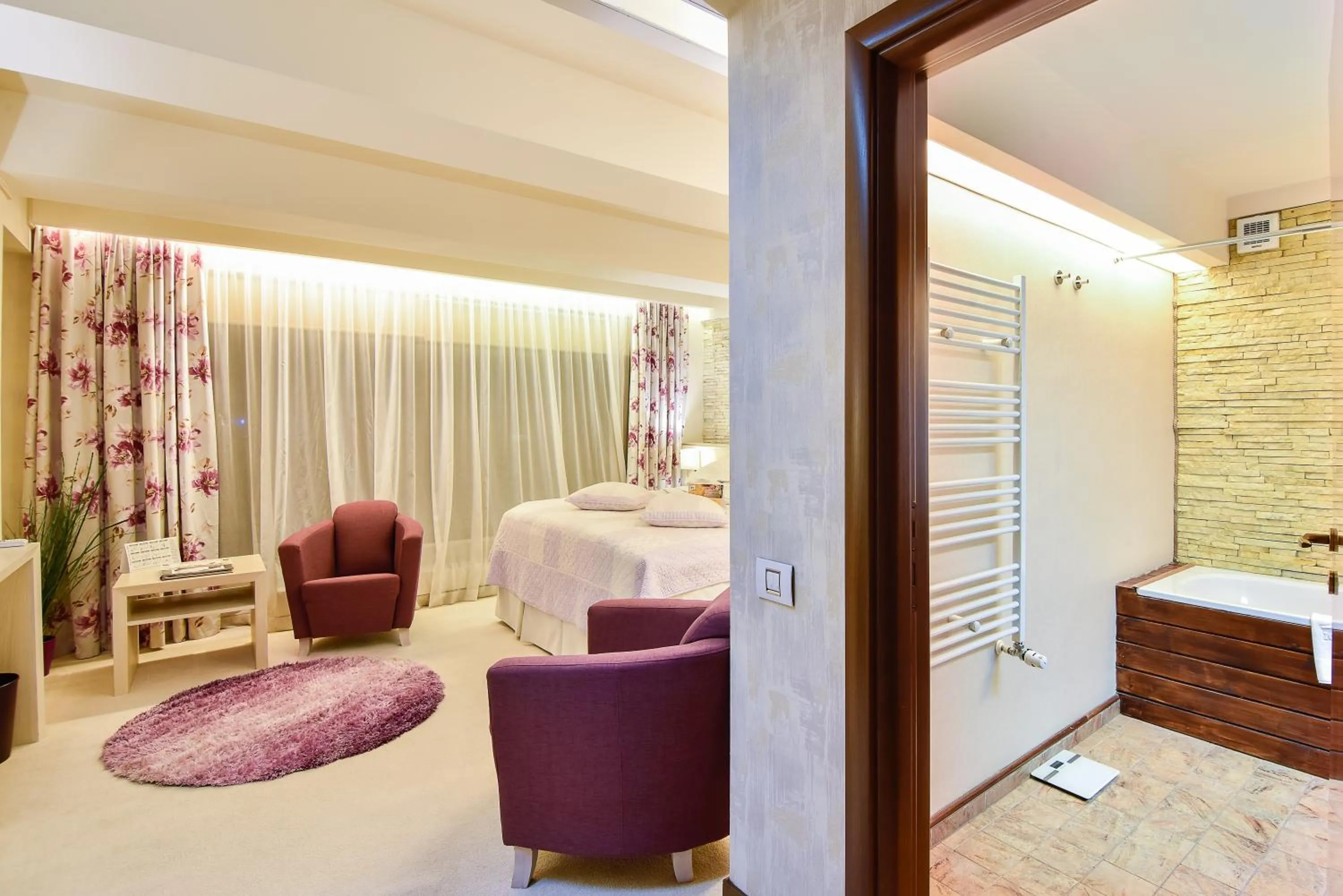 Bed in Ioana Boutique Hotel