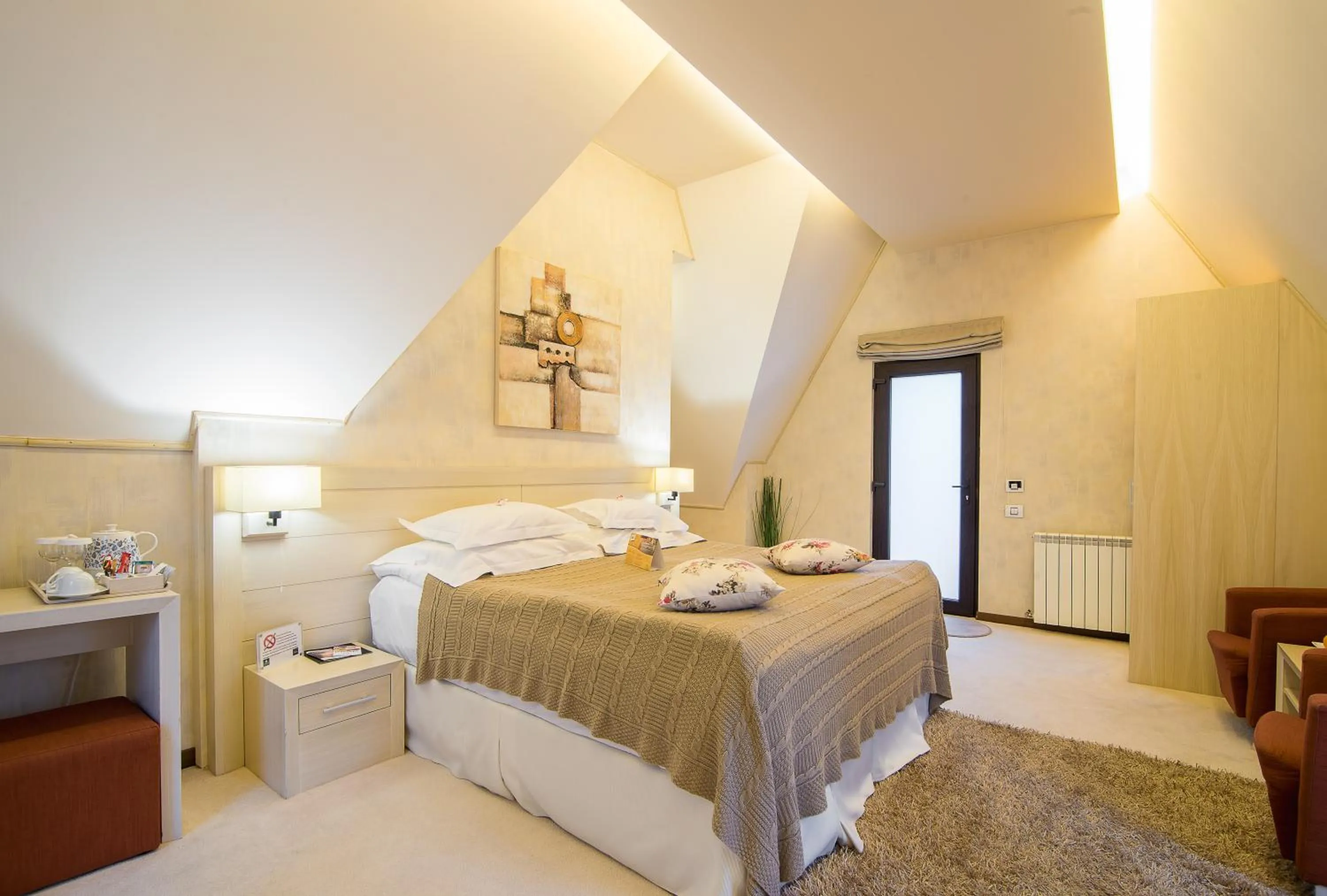 Bed in Ioana Boutique Hotel