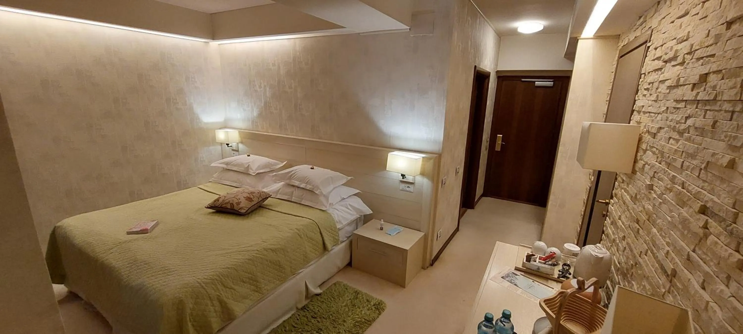 Bed in Ioana Boutique Hotel