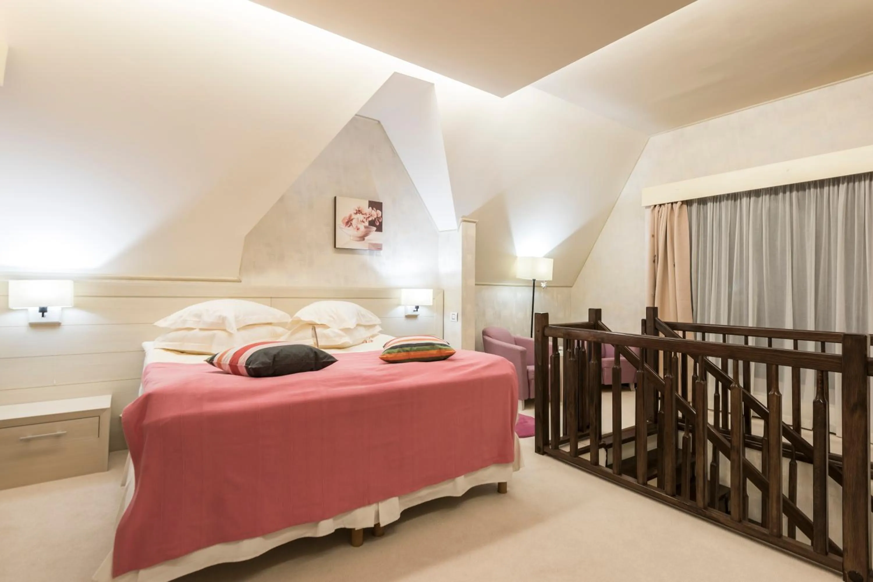 Bed in Ioana Boutique Hotel
