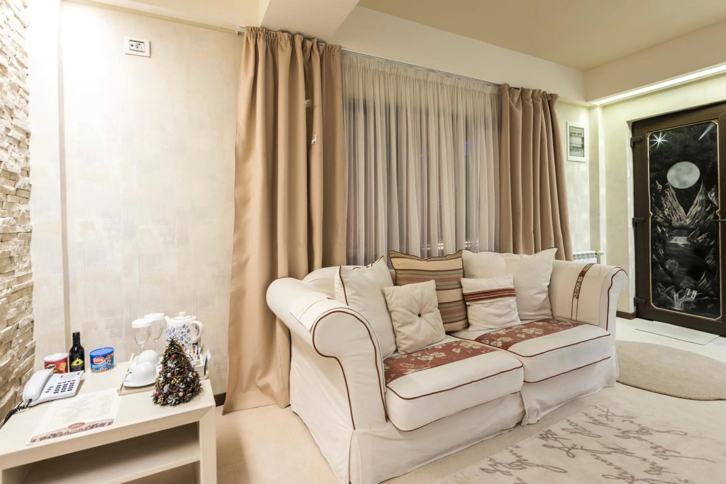 Living room in Ioana Boutique Hotel