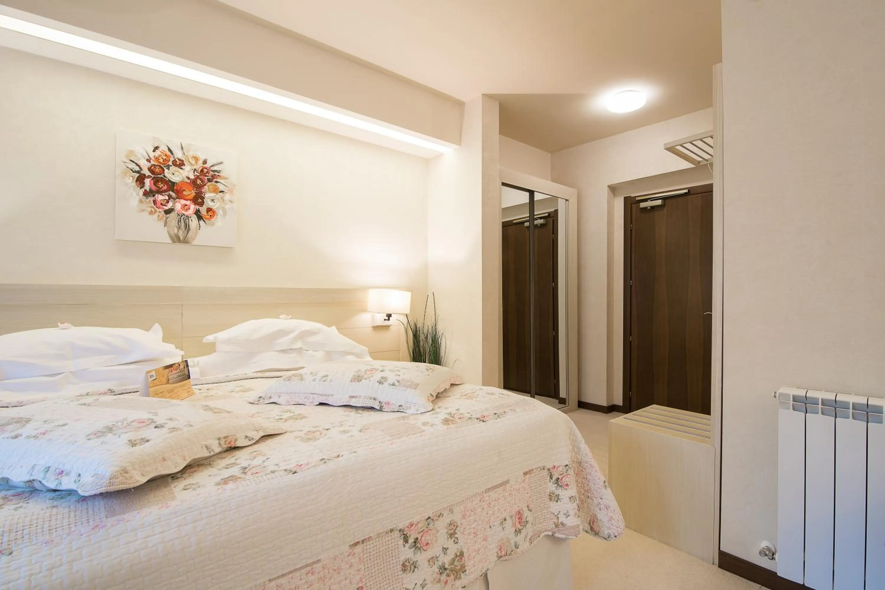 Bed in Ioana Boutique Hotel