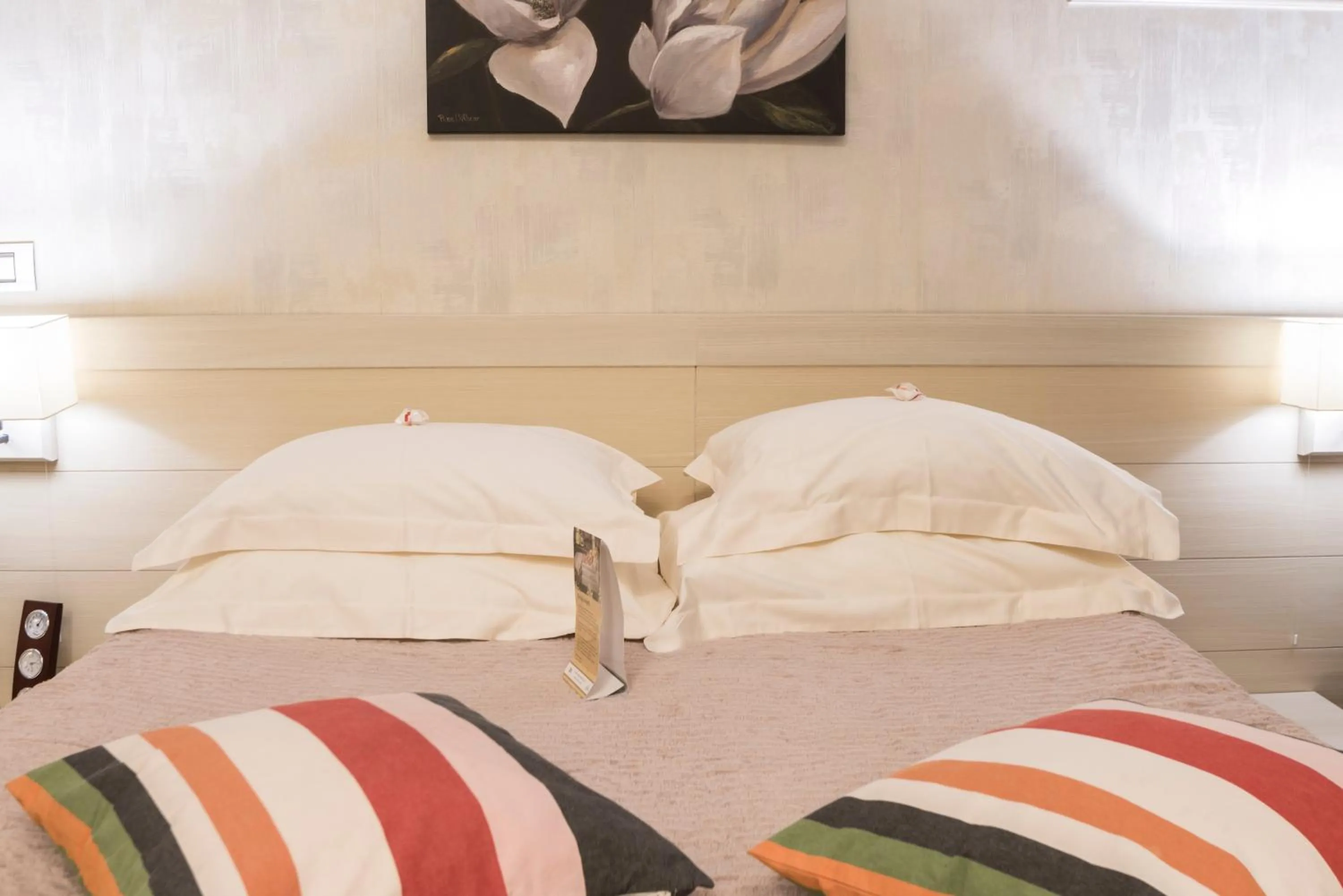 Bed in Ioana Boutique Hotel