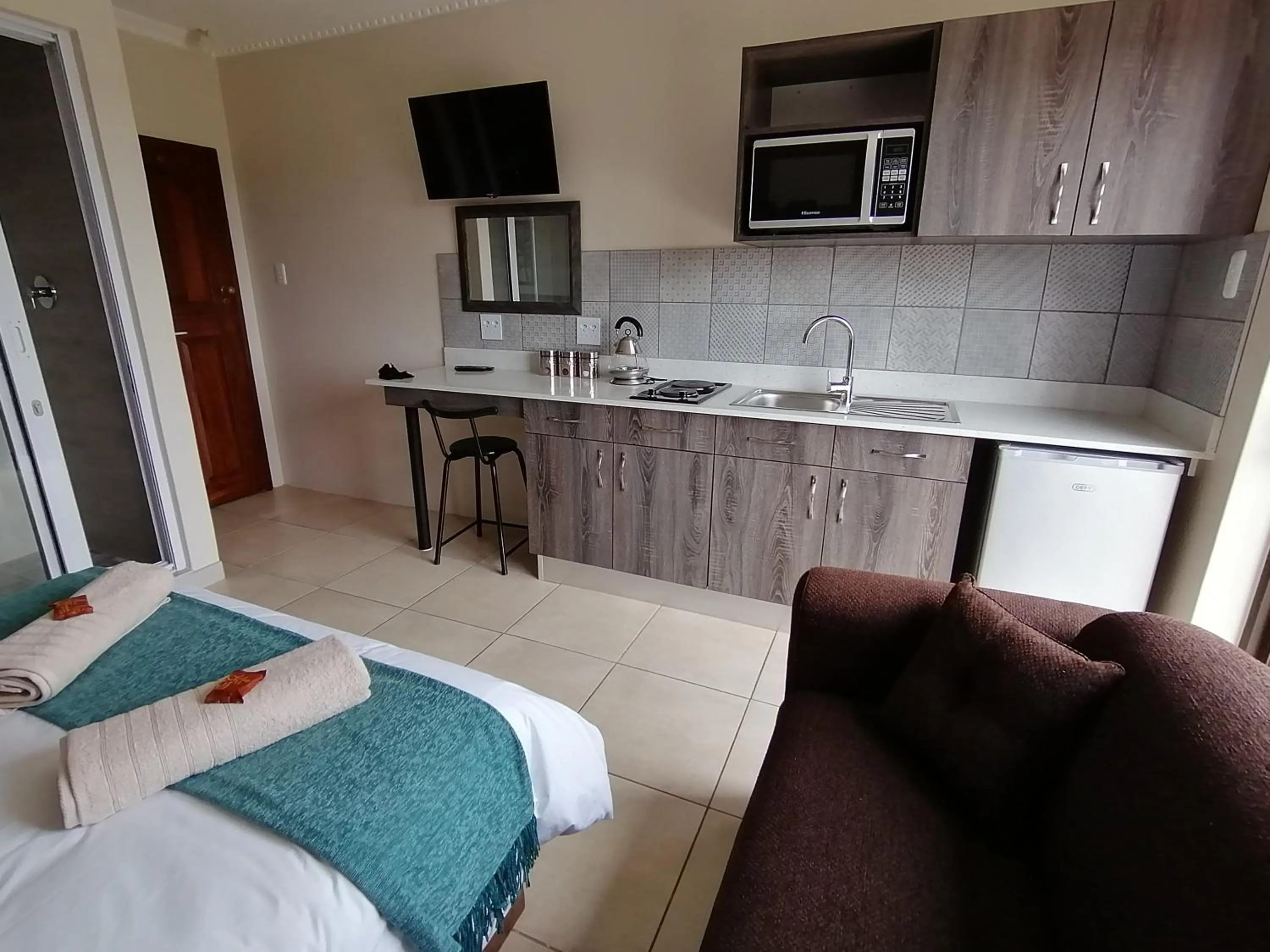 Kitchen or kitchenette in Blue Sea Guest House