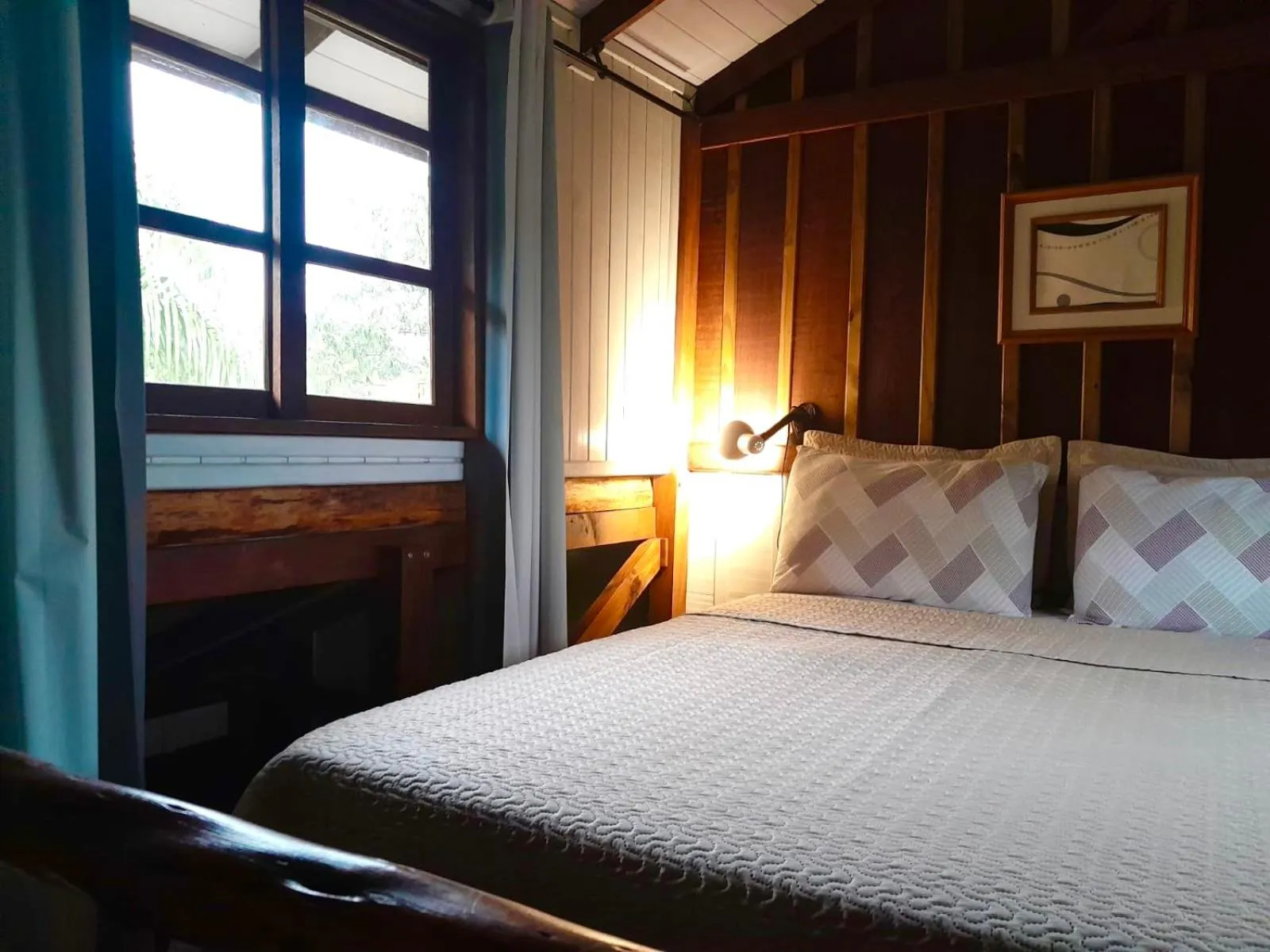 Bed in Recanto das Bromélias Chalés