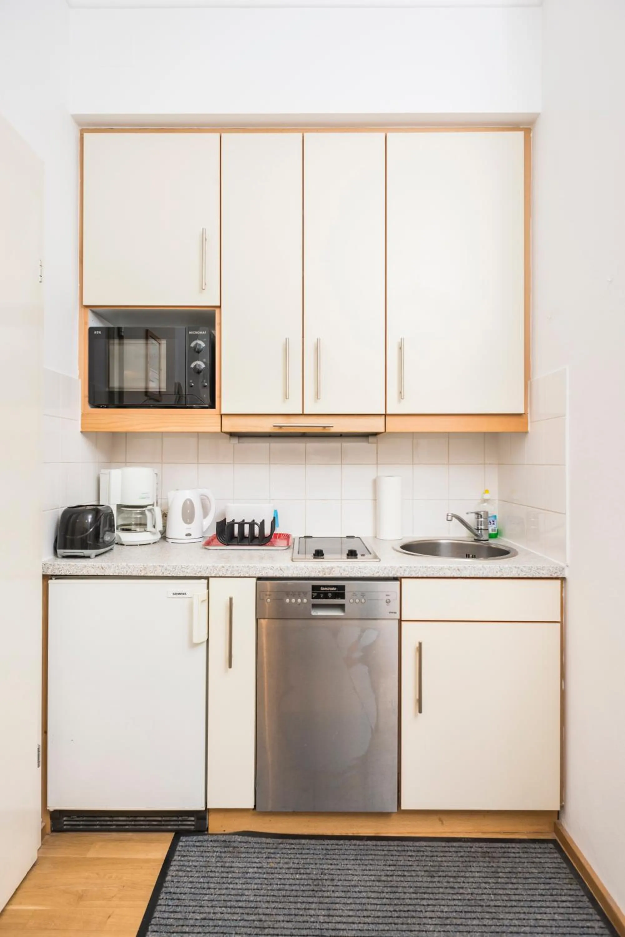 Kitchen or kitchenette in Appartements Ferchergasse