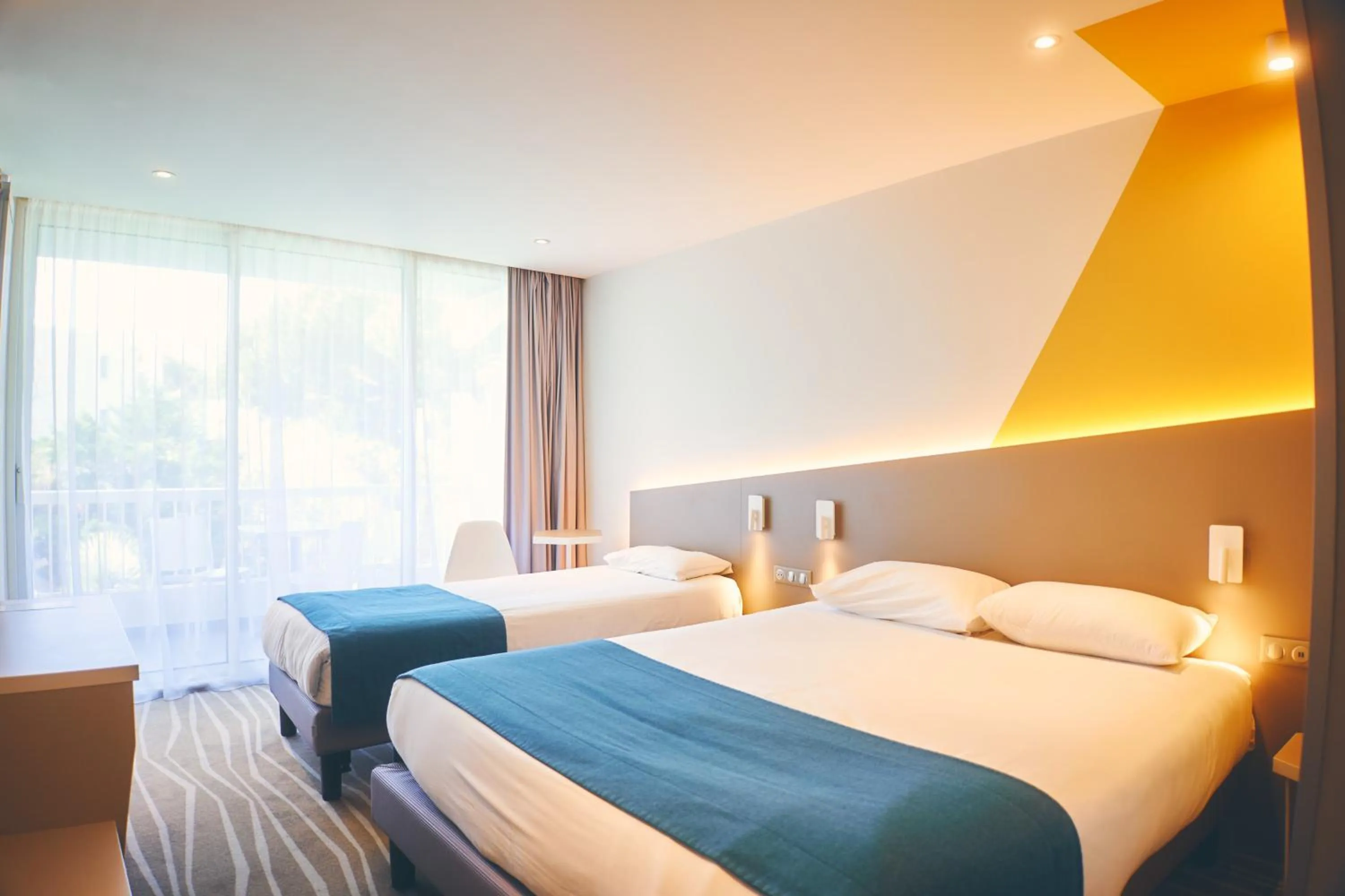 Bed in Hotel Le Quetzal