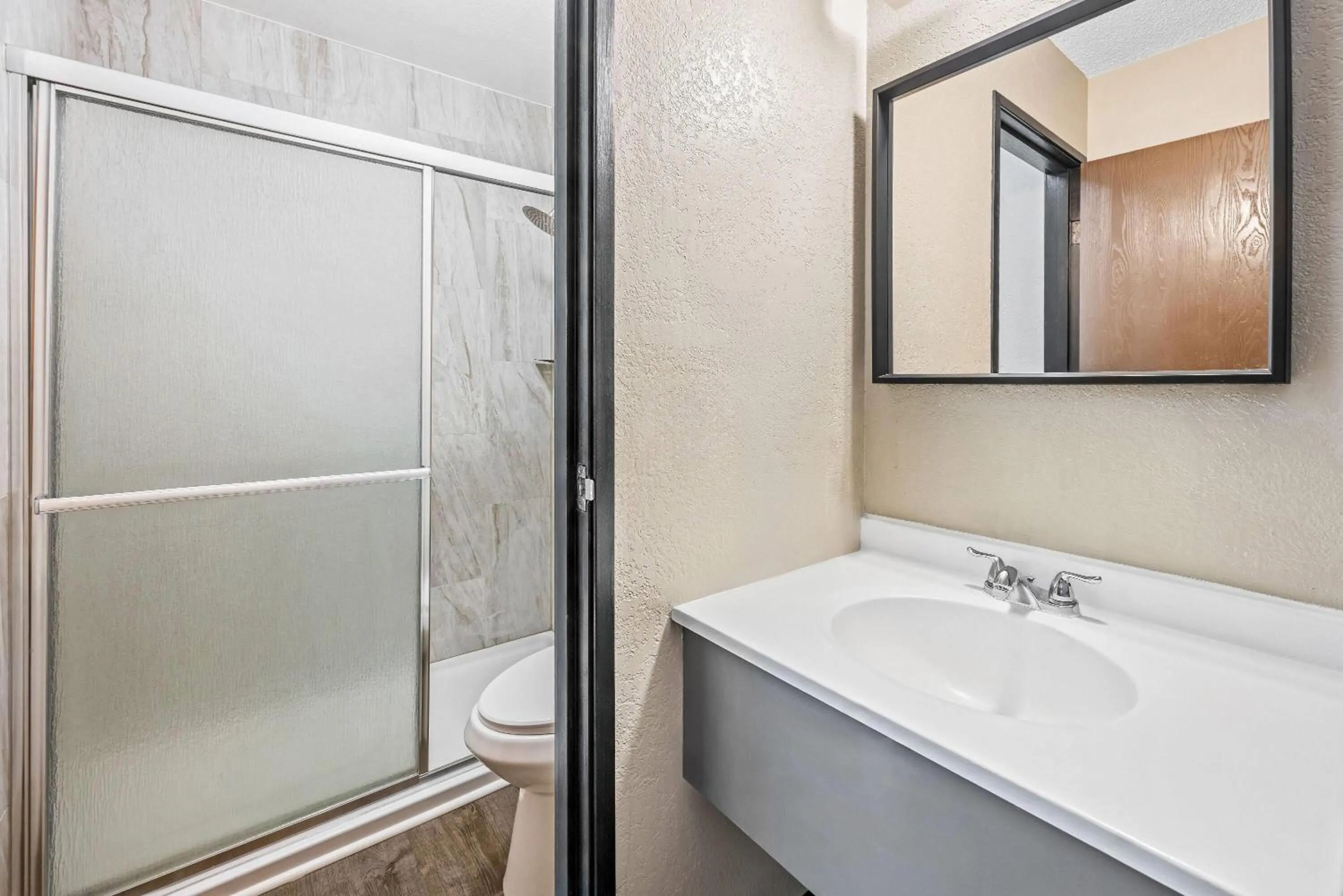 Bathroom in Super 8 by Wyndham Colorado Springs Peterson Space Force