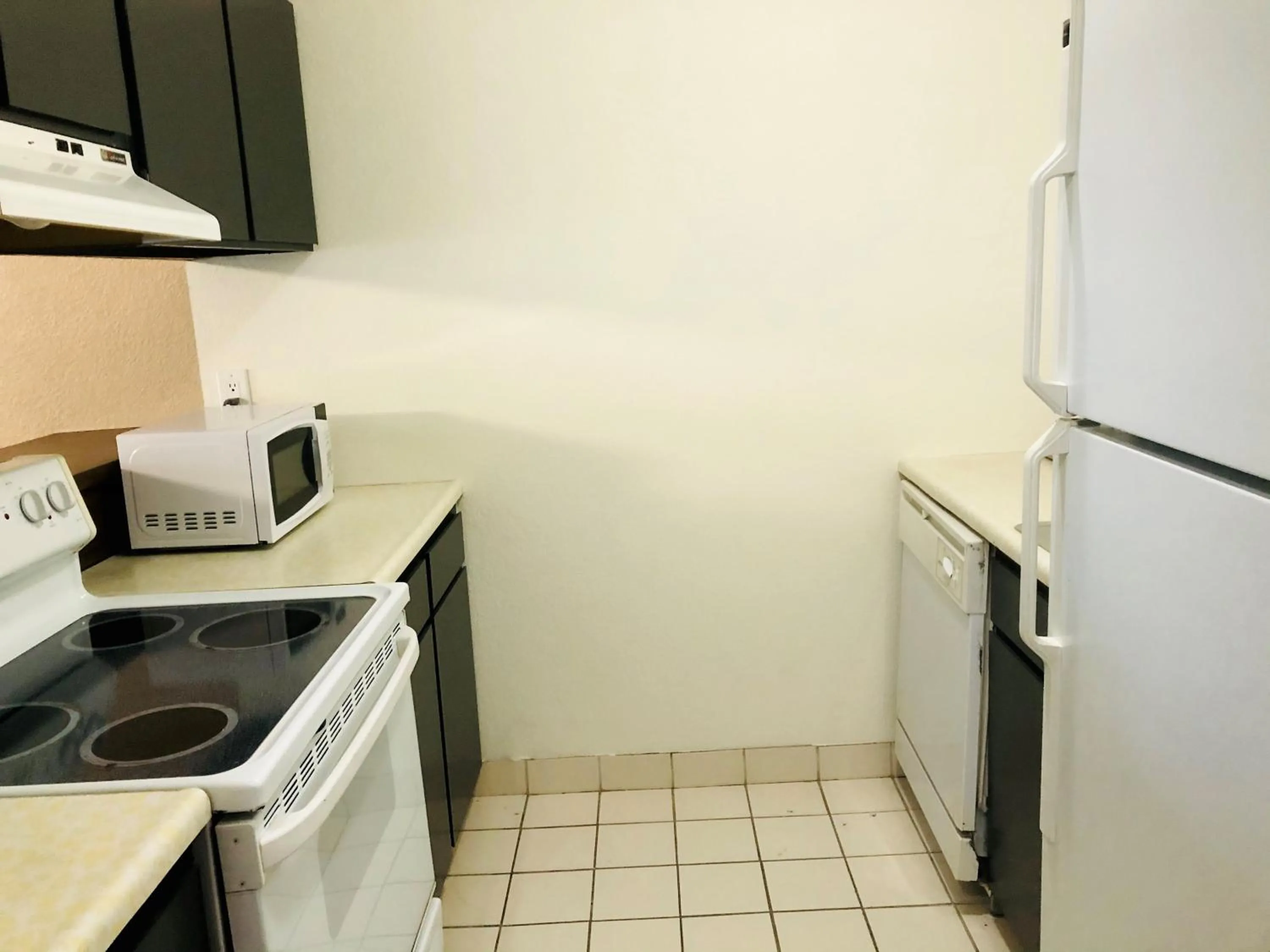 Kitchen or kitchenette in Ramada by Wyndham Spokane Valley